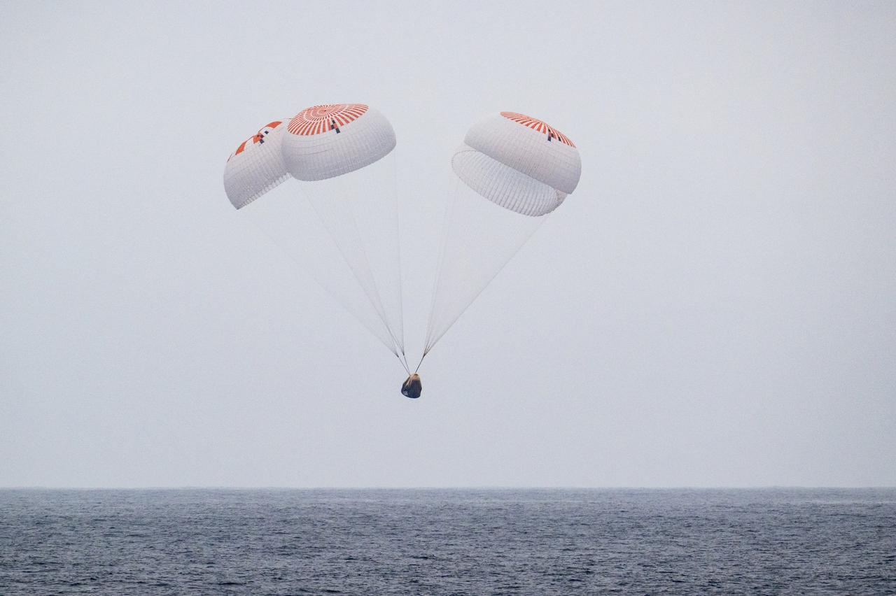 The SpaceX Crew Dragon Endurance spacecraft is seen as it lands with NASA astronauts Anne McClain and Nichole Ayers, JAXA (Japan Aerospace Exploration Agency) astronaut Takuya Onishi, and Roscosmos cosmonaut Kirill Peskov aboard in the Pacific Ocean off the coast of San Diego, Calif., Saturday, Aug. 9, 2025. McClain, Ayers, Onishi, and Peskov are returning after 147 days in space as part of Expedition 73 aboard the International Space Station. Photo Credit: (NASA/Keegan Barber)