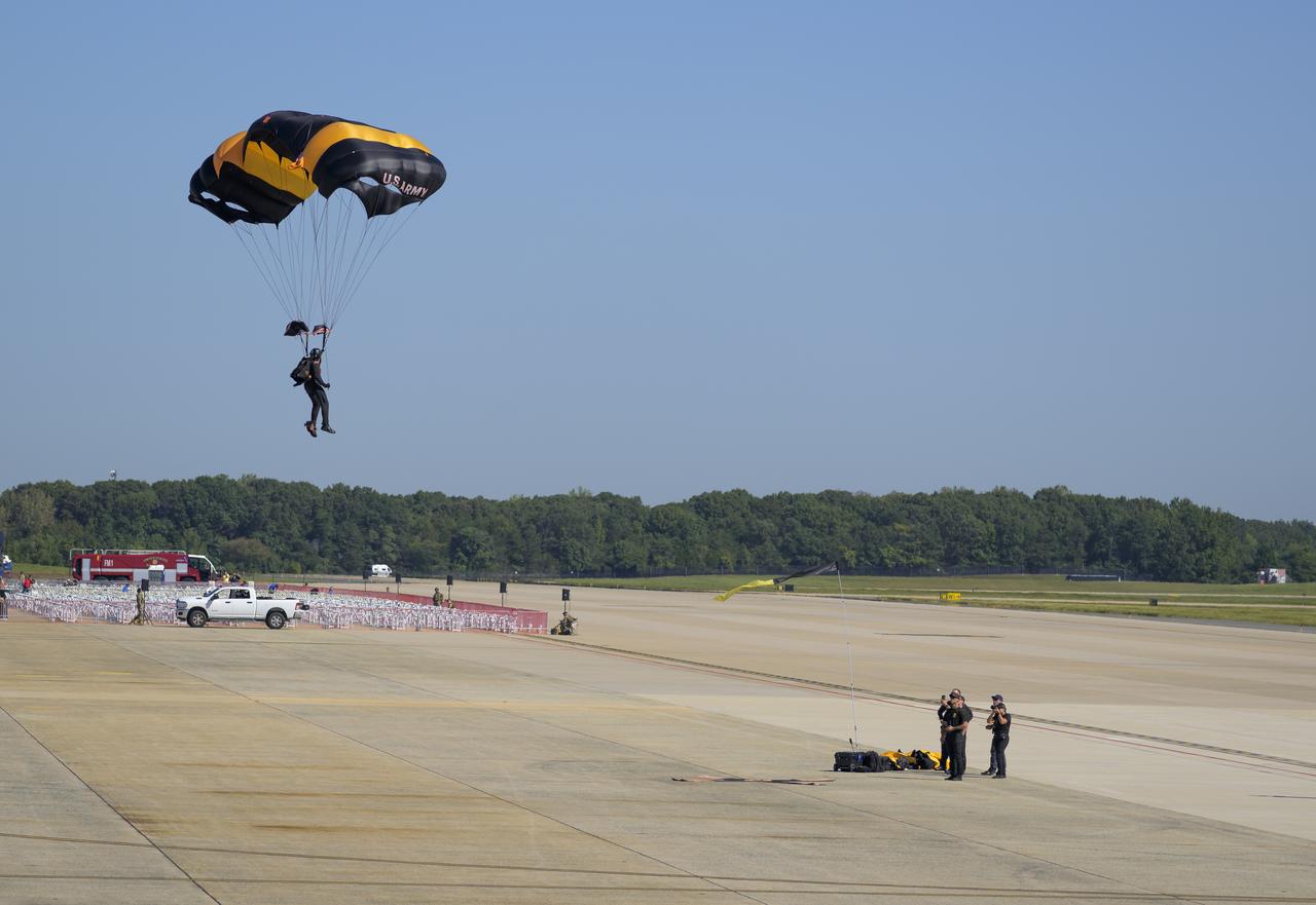 The United States Army Parachute Team, the Golden Knights, are seen during the opening ceremony of the Joint Base Andrews Air Show, Friday, Sept. 12, 2025, at Joint Base Andrews in Prince George's County, Maryland. NASA astronaut Nick Hague was on hand to provide remarks and meet with guests. Hague spent 171 days onboard the International Space Station as part of Expedition 72. Photo Credit: (NASA/Bill Ingalls)