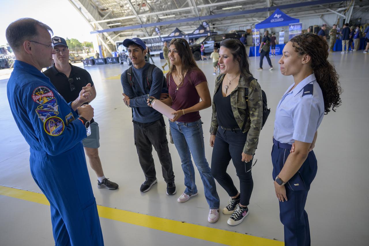 NASA astronaut Nick Hague meets with attendees, Friday, Sept. 12, 2025, during the Joint Base Andrews Air Show at Joint Base Andrews in Prince George's County, Maryland. Hague spent 171 days onboard the International Space Station as part of Expedition 72. Photo Credit: (NASA/Bill Ingalls)