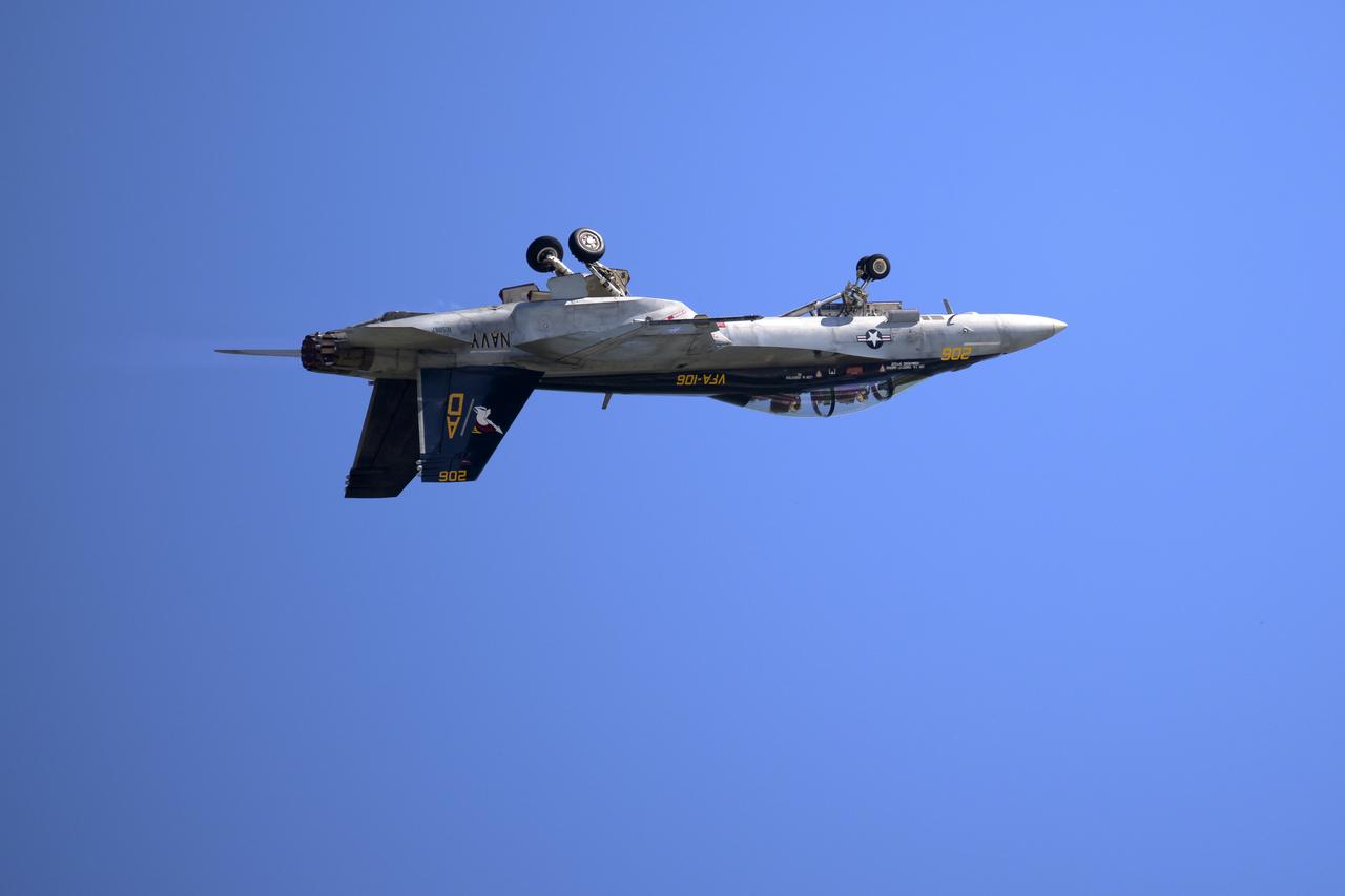 A U.S. Navy F/A-15F Super Hornet jet performs, Friday, Sept. 12, 2025, during the Joint Base Andrews Air Show at Joint Base Andrews in Prince George's County, Maryland. NASA astronaut Nick Hague was on hand to provide remarks and meet with guests. Hague spent 171 days onboard the International Space Station as part of Expedition 72. Photo Credit: (NASA/Bill Ingalls)