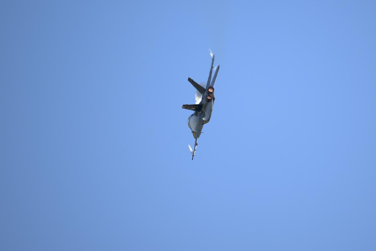 A U.S. Navy F/A-15F Super Hornet jet performs, Friday, Sept. 12, 2025, during the Joint Base Andrews Air Show at Joint Base Andrews in Prince George's County, Maryland. NASA astronaut Nick Hague was on hand to provide remarks and meet with guests. Hague spent 171 days onboard the International Space Station as part of Expedition 72. Photo Credit: (NASA/Bill Ingalls)