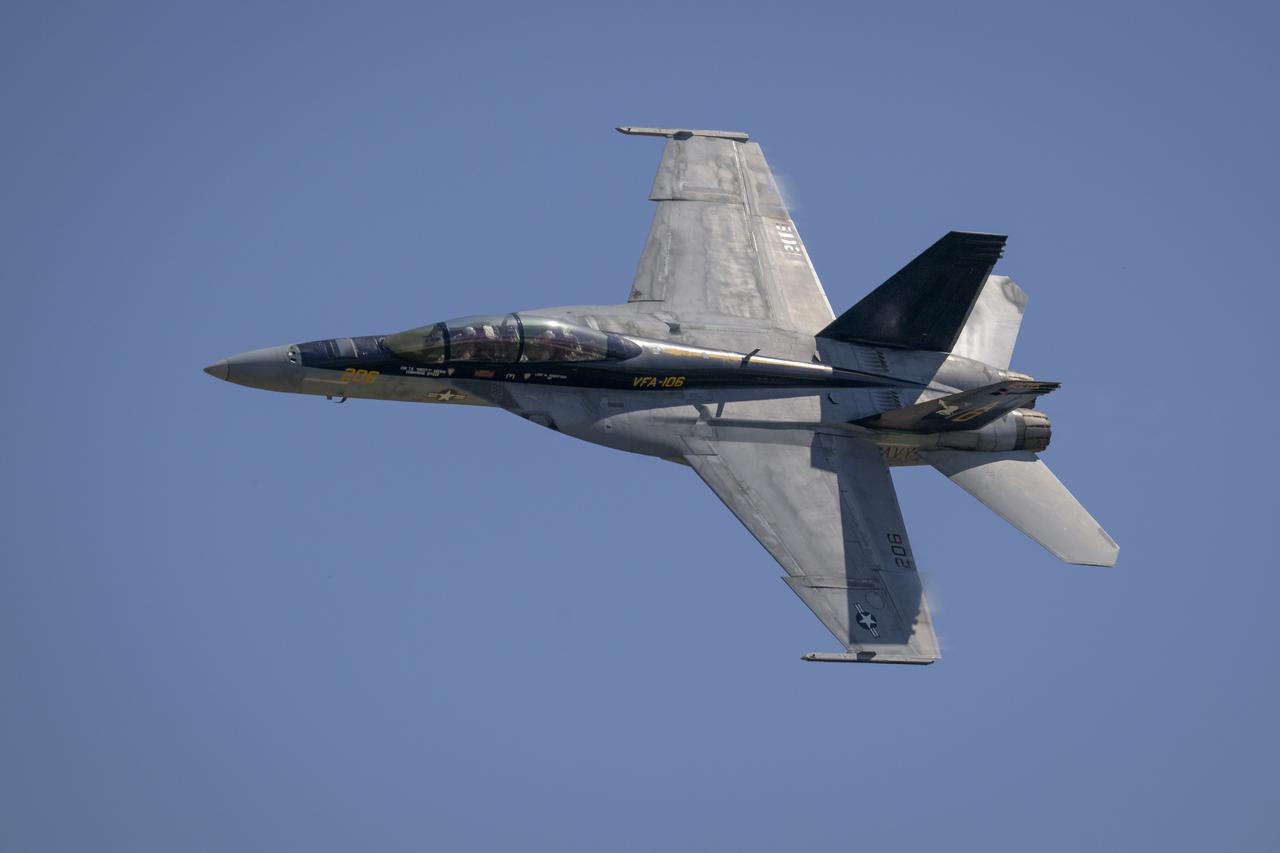 A U.S. Navy F/A-15F Super Hornet jet performs, Friday, Sept. 12, 2025, during the Joint Base Andrews Air Show at Joint Base Andrews in Prince George's County, Maryland. NASA astronaut Nick Hague was on hand to provide remarks and meet with guests. Hague spent 171 days onboard the International Space Station as part of Expedition 72. Photo Credit: (NASA/Bill Ingalls)