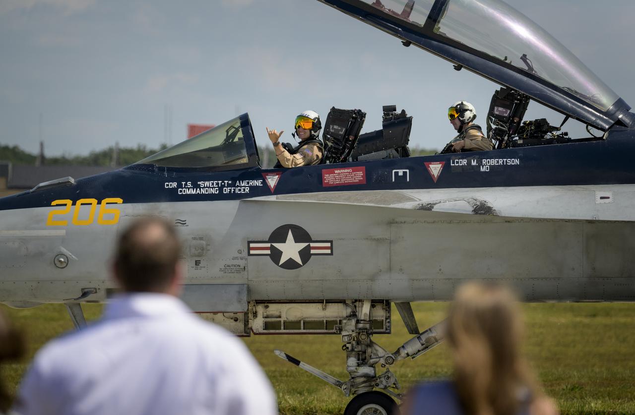 Pilots taxi past spectators in their U.S. Navy F/A-15F Super Hornet jet, Friday, Sept. 12, 2025, during the Joint Base Andrews Air Show at Joint Base Andrews in Prince George's County, Maryland. NASA astronaut Nick Hague was on hand to provide remarks and meet with guests. Hague spent 171 days onboard the International Space Station as part of Expedition 72. Photo Credit: (NASA/Bill Ingalls)