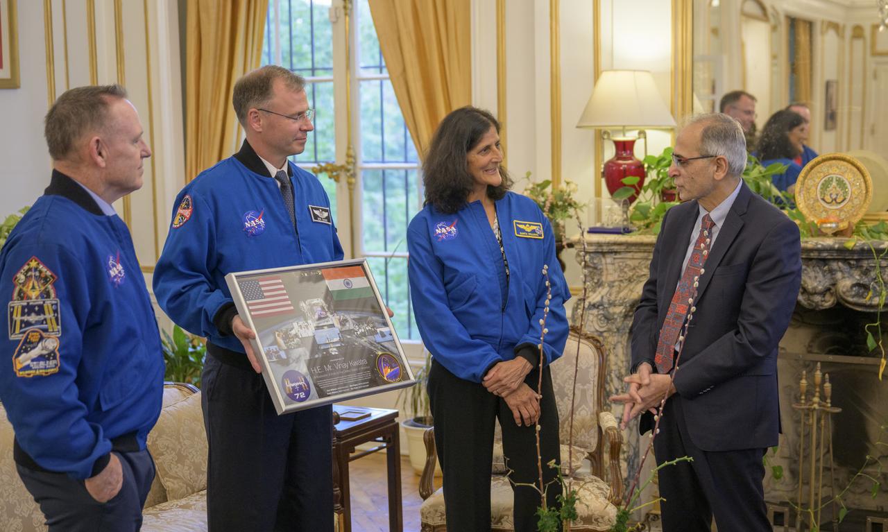 NASA astronauts, Butch Wilmore, left, Nick Hague, and Suni Williams, right, speak with Ambassador of India to the United States H.E. Mr. Vinay Kwatra, Monday, Sept. 15, 2025, at residence of the Ambassador Washington. Williams, Hague and Wilmore served as part of Expedition 72 onboard the International Space Station. Photo Credit: (NASA/Bill Ingalls)