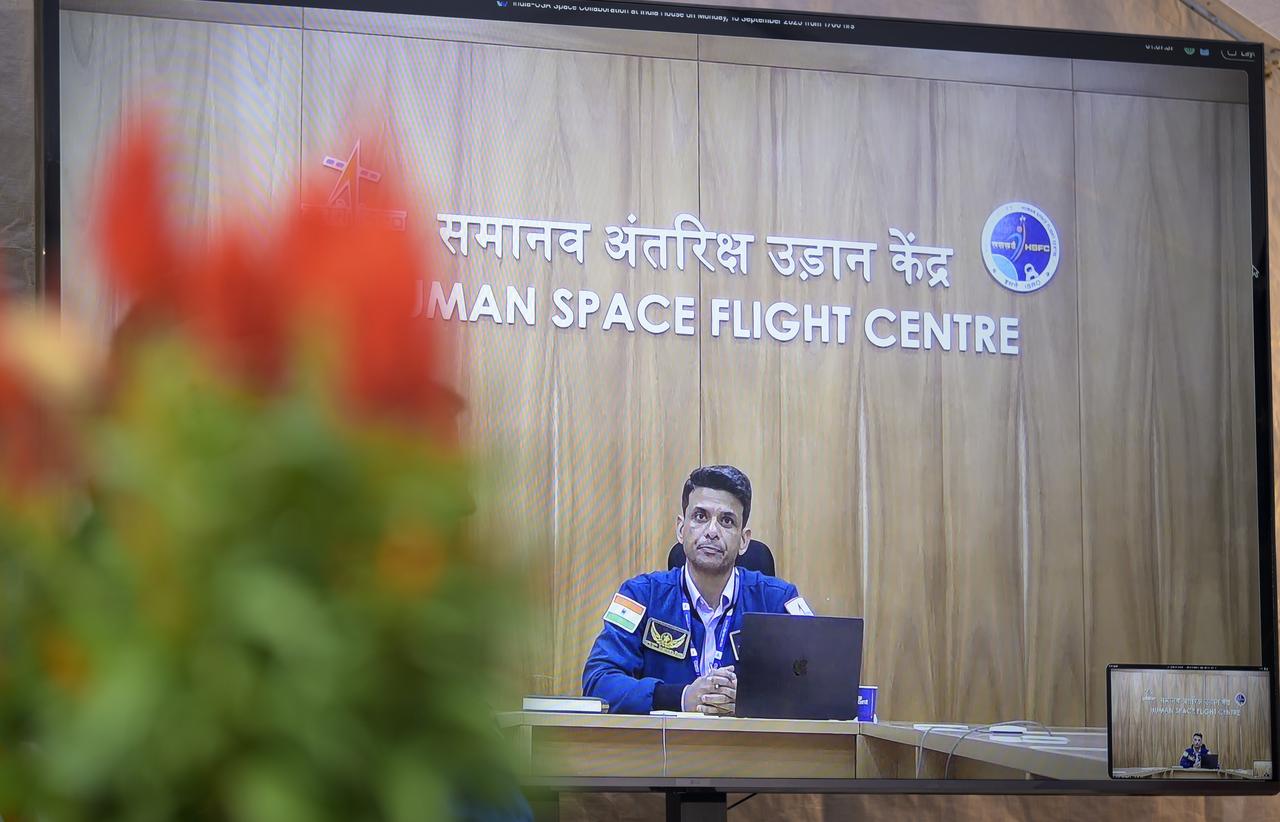 Axiom Mission 4 astronaut Shubhanshu Shukla is seen on a television monitor during a panel discussion moderated by NASA Deputy Associate Administrator Casey Swails, Monday, Sept. 15, 2025, at residence of the Ambassador of India in Washington. NASA astronauts Suni Williams, Nick Hague and Butch Wilmore, also in attendance,  served as part of Expedition 72 onboard the International Space Station. Photo Credit: (NASA/Bill Ingalls)