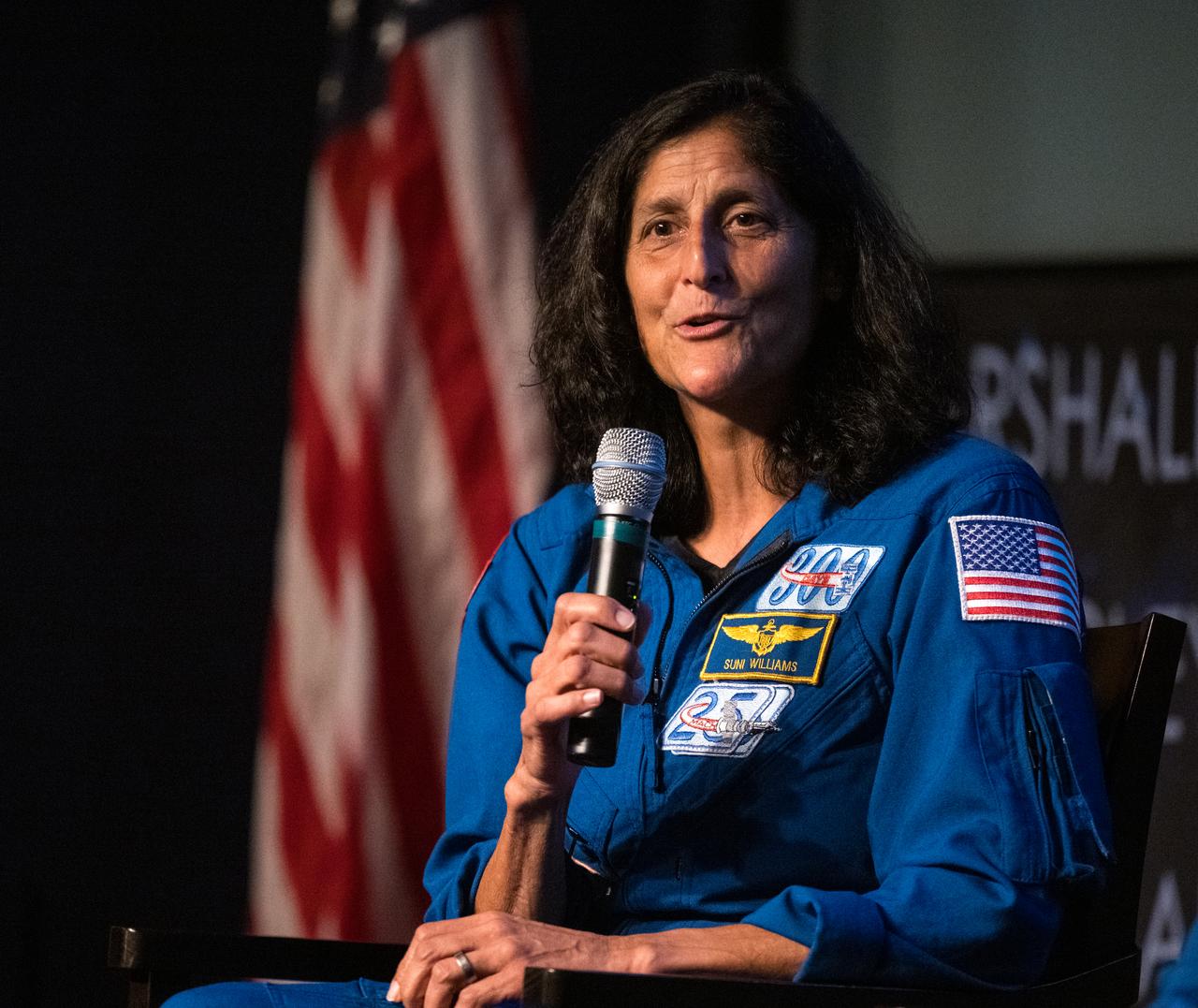 NASA astronaut Suni Williams speaks about her time onboard the International Space Station as part of Expedition 72, Wednesday, Sept. 17, 2025, during an employee engagement event at the Mary W. Jackson NASA Headquarters building in Washington. Nick Hague, Suni Williams, Butch Wilmore, and Don Pettit served as part of Expedition 72 onboard the orbiting laboratory. Photo Credit: (NASA/Aubrey Gemignani)