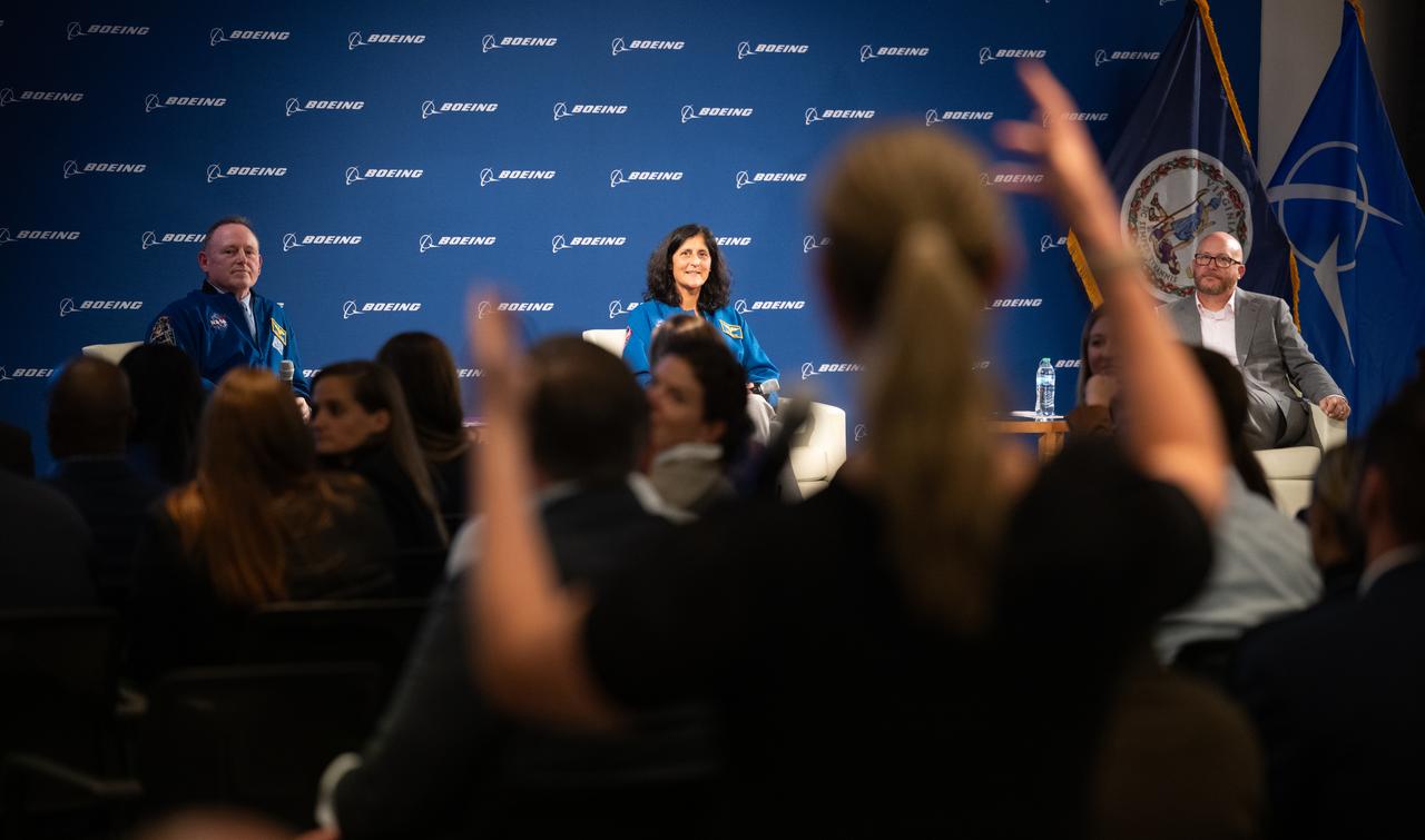 NASA astronauts Suni Williams, center, Butch Wilmore, left, and Steve Parker, executive vice president, president and CEO of Boeing Defense, Space and Security, listen to a question as they speak with employees of Boeing, Wednesday, Sept. 17, 2025, at the company’s headquarters in Arlington, Va. Williams and Wilmore launched aboard Boeing’s Starliner spacecraft to the International Space Station as part of the agency’s Boeing Crew Flight Test and were integrated into Expedition 71/72 following the uncrewed return of Starliner. The pair returned to Earth with NASA’s SpaceX Crew 9 astronauts. Photo Credit: (NASA/Joel Kowsky)