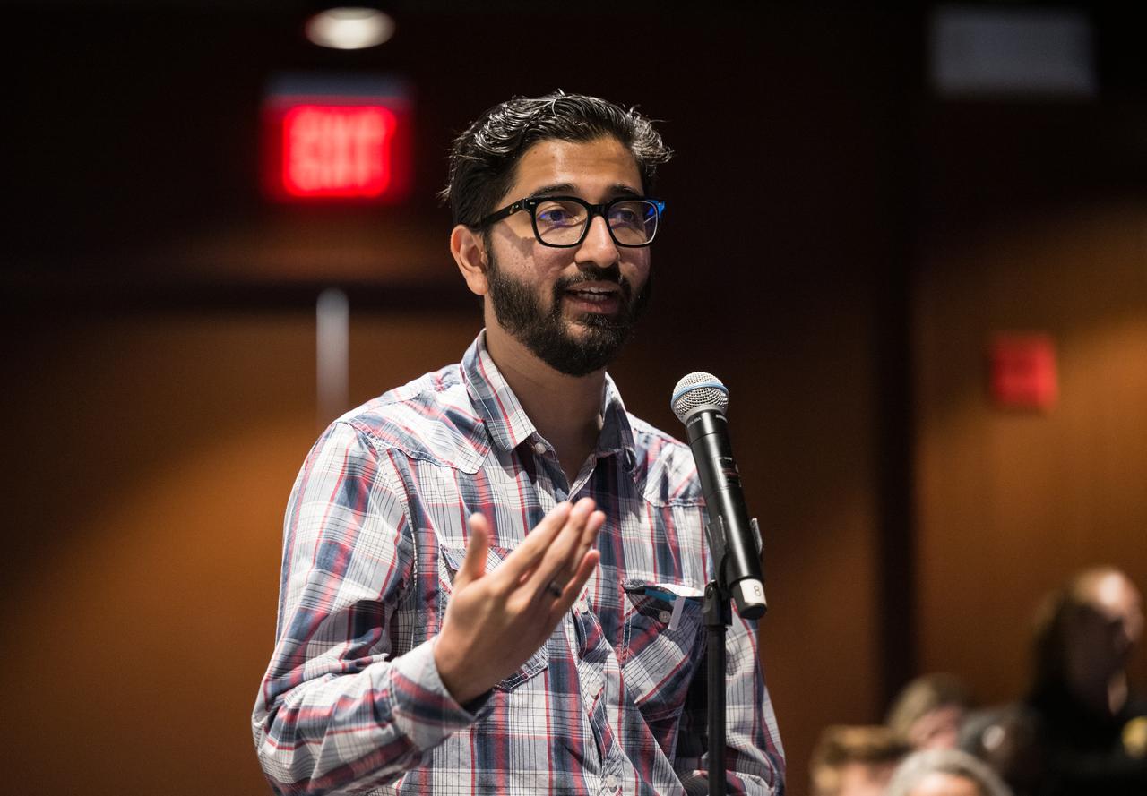 Sachin Thackeray, NASA Research Assistant Specialist at NASA’s Goddard Space Flight Center, asks a question during a Silver Snoopy award presentation event where NASA astronauts Don Pettit and Nick Hague spoke about their time onboard the International Space Station as part of Expedition 72, Wednesday, Sept. 17, 2025, at NASA’s Goddard Space Flight Center in Greenbelt, Md. Photo Credit: (NASA/Aubrey Gemignani)