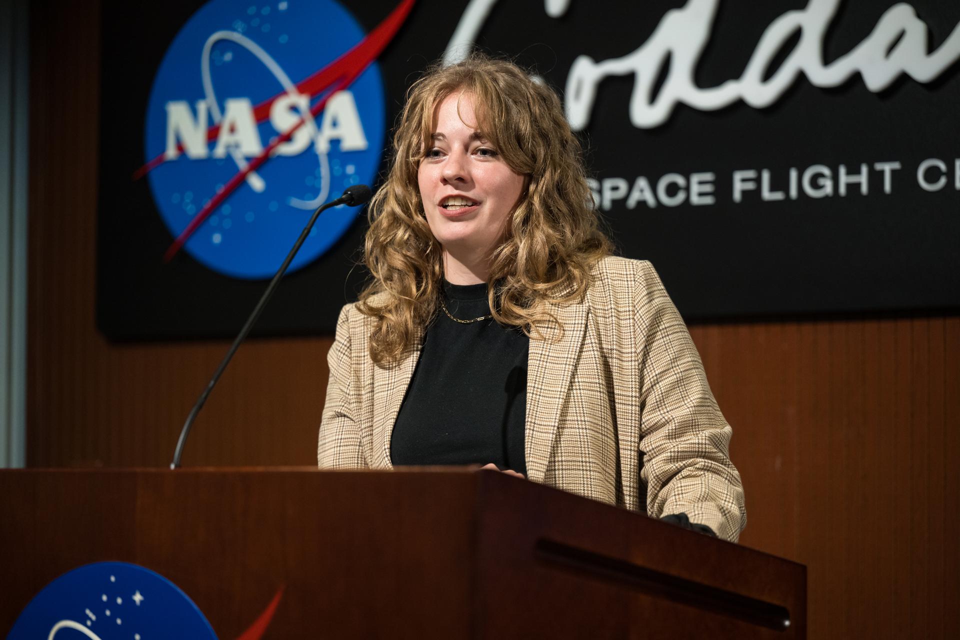 NASA Space Flight Awareness Backup Lead for Goddard Space Flight Center, Amelia Haymes, provides remarks before NASA astronauts Don Pettit and Nick Hague present NASA Range Operations Contract Engineer Manager at Wallops Flight Facility, Joseph Jimmerson, with a Silver Snoopy award, Wednesday, Sept. 17, 2025, at NASA’s Goddard Space Flight Center in Greenbelt, Md. Pettit and Hague served as part of Expedition 72 onboard the International Space Station. Photo Credit: (NASA/Aubrey Gemignani)