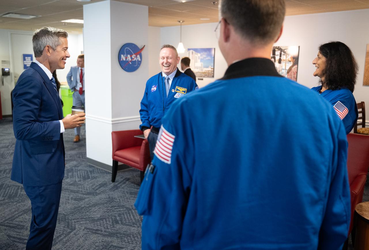 Acting NASA Administrator Sean Duffy speaks with NASA astronauts Butch Wilmore, Nick Hague, and Suni Williams, Thursday, Sept. 18, 2025, at the Mary W. Jackson NASA Headquarters building in Washington. Hague, Wilmore, Williams, and Don Pettit served as part of Expedition 72 onboard the orbiting laboratory.  Photo Credit: (NASA/Joel Kowsky)