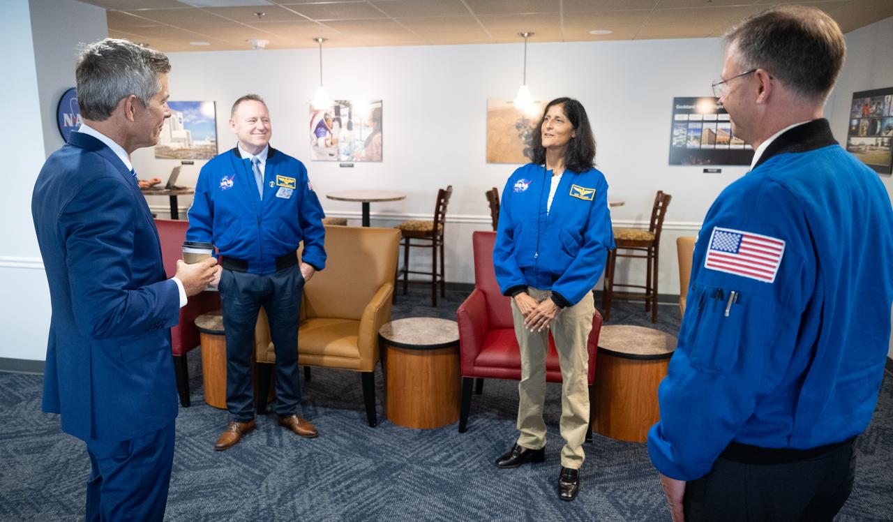 Acting NASA Administrator Sean Duffy speaks with NASA astronauts Butch Wilmore, Nick Hague, and Suni Williams, Thursday, Sept. 18, 2025, at the Mary W. Jackson NASA Headquarters building in Washington. Hague, Wilmore, Williams, and Don Pettit served as part of Expedition 72 onboard the orbiting laboratory.  Photo Credit: (NASA/Joel Kowsky)