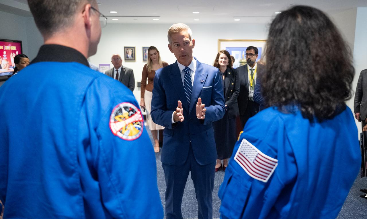 Acting NASA Administrator Sean Duffy speaks with NASA astronauts Butch Wilmore, Suni Williams, Don Pettit, and Nick Hague, Thursday, Sept. 18, 2025, at the Mary W. Jackson NASA Headquarters building in Washington. Hague, Wilmore, Williams, and Pettit served as part of Expedition 72 onboard the orbiting laboratory.  Photo Credit: (NASA/Joel Kowsky)