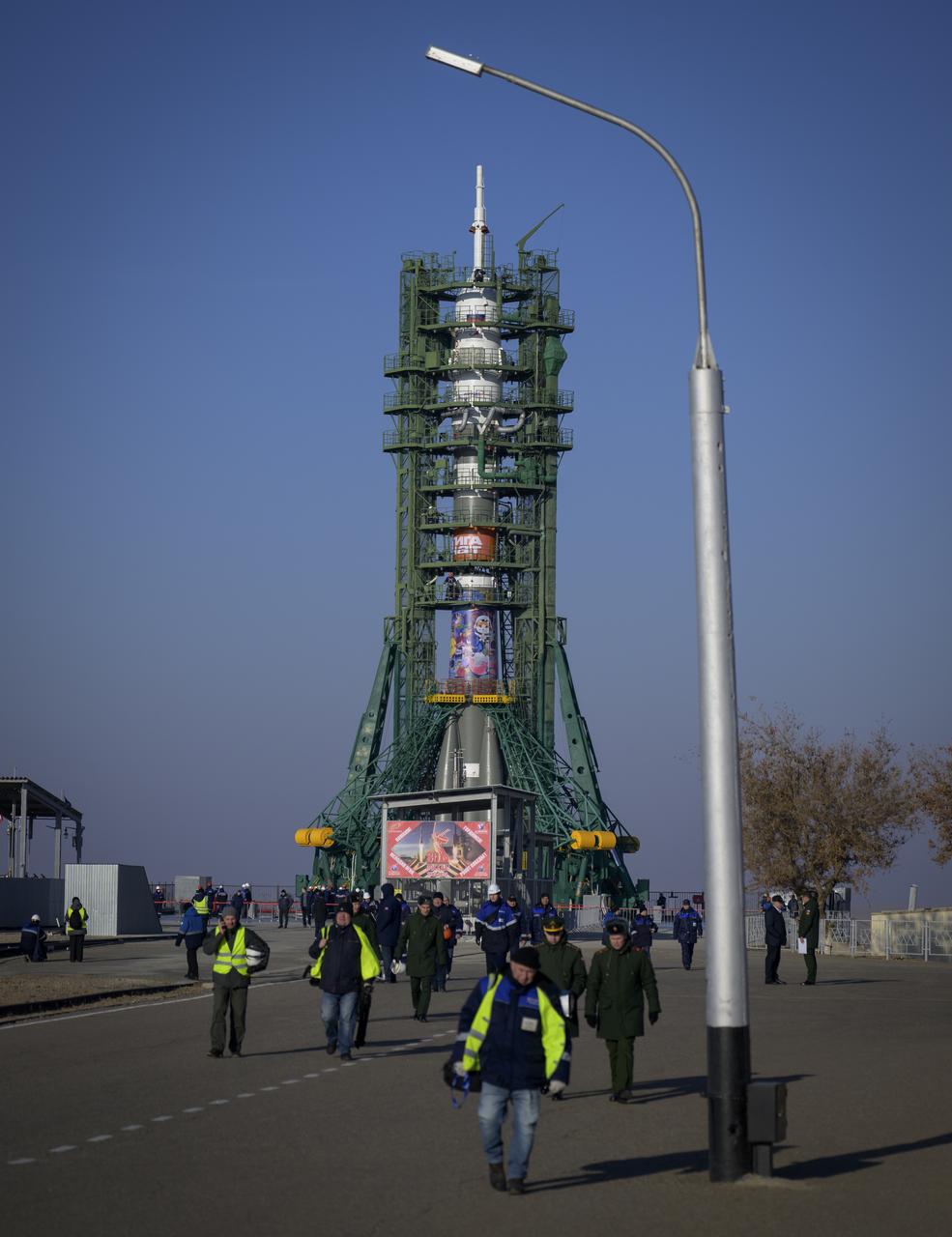 The Soyuz rocket is seen after having been rolled out by train to the launch pad, Monday, Nov. 24, 2025, at Site 31 of the Baikonur Cosmodrome in Kazakhstan. Expedition 74 crewmembers: NASA astronaut Chris Williams, Roscosmos cosmonauts Sergey Kud-Sverchkov and Sergey Mikaev are scheduled to launch aboard their Soyuz MS-28 spacecraft on November 27. Photo Credit: (NASA/Bill Ingalls)
