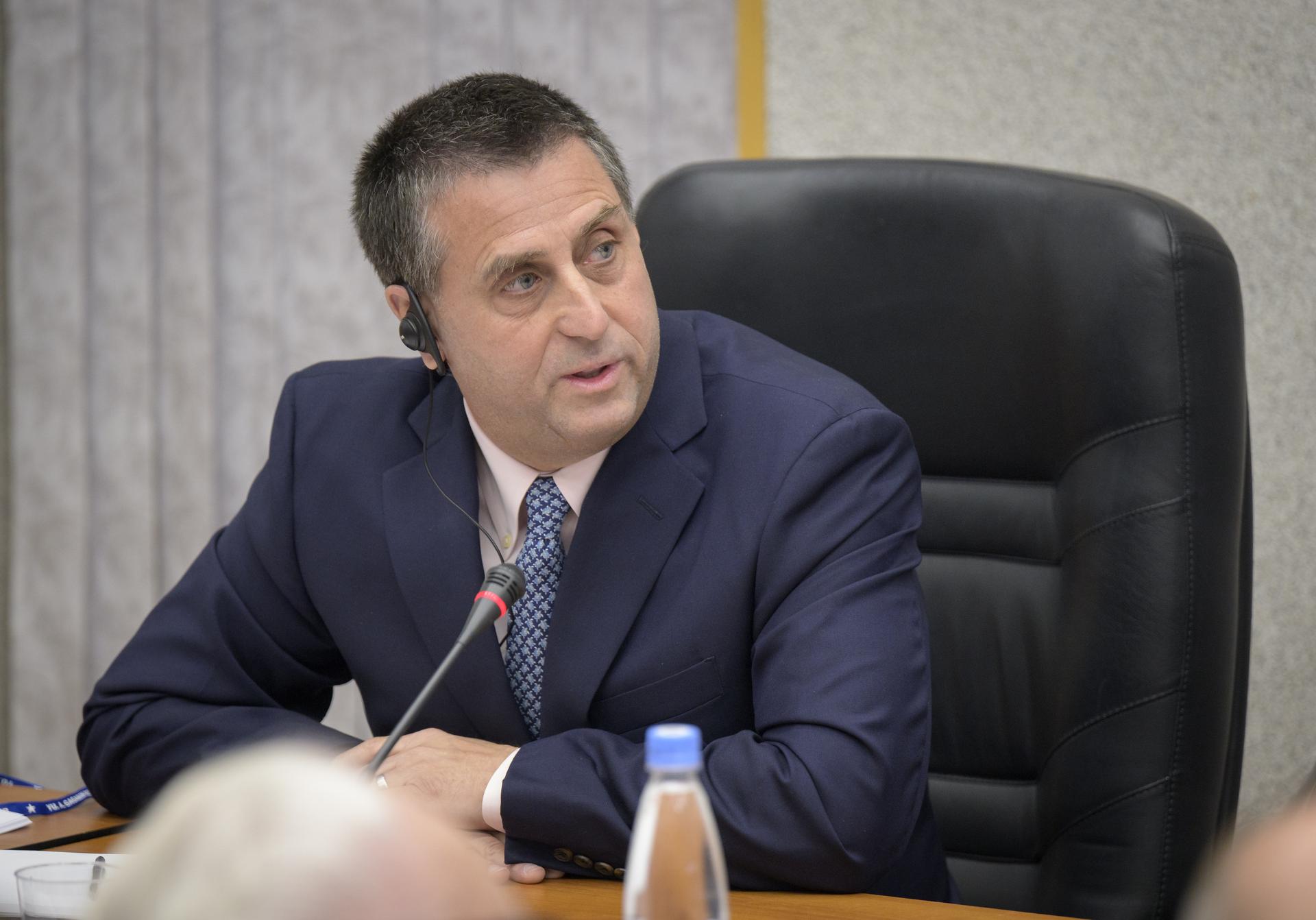 NASA Deputy Associate Administrator for NASA's Space Operations Mission Directorate, Joel Montalbano, is seen during the State Commission meeting to approve the Soyuz launch of Expedition 74 to the International Space Station, Wednesday, Nov. 26, 2025 at the Cosmonaut Hotel in Baikonur, Kazakhstan. Expedition 74 crewmembers: NASA astronaut Chris Williams, Roscosmos cosmonauts Sergey Kud-Sverchkov and Sergei Mikaev, are scheduled to launch aboard their Soyuz MS-28 spacecraft on November 27. Photo Credit: (NASA/Bill Ingalls)