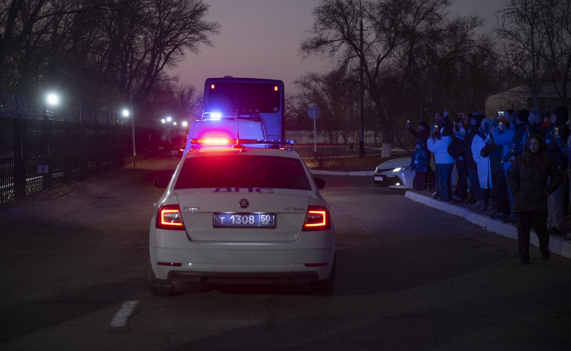 The bus carrying Expedition 74 crewmembers: NASA astronaut Chris Williams, Roscosmos cosmonauts Sergey Kud-Sverchkov, and Sergei Mikaev, departs the Cosmonaut Hotel to building 254 for the trio to suit-up for their Soyuz launch, Thursday, Nov. 27, 2025, in Baikonur, Kazakhstan. The launch will send Williams, Kud-Sverchkov and Mikaev, on a mission to the International Space Station. Photo Credit: (NASA/Bill Ingalls)