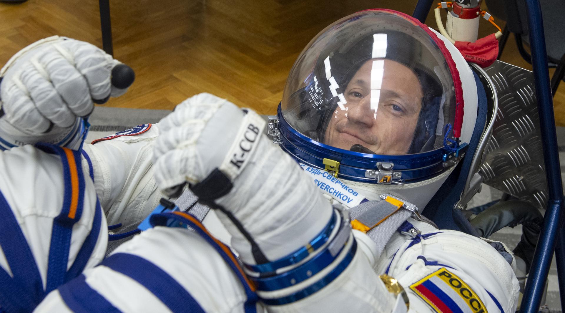 Roscosmos cosmonaut Sergey Kud-Sverchkov has his Russian Sokol suit pressure checked as he and fellow crewmates, NASA astronaut Chris Williams, and Roscosmos cosmonaut Sergei Mikaev, prepare for their Soyuz launch to the International Space Station Thursday, Nov. 27, 2025 in Baikonur, Kazakhstan. Photo Credit: (NASA/GCTC/Pavel Shvets)