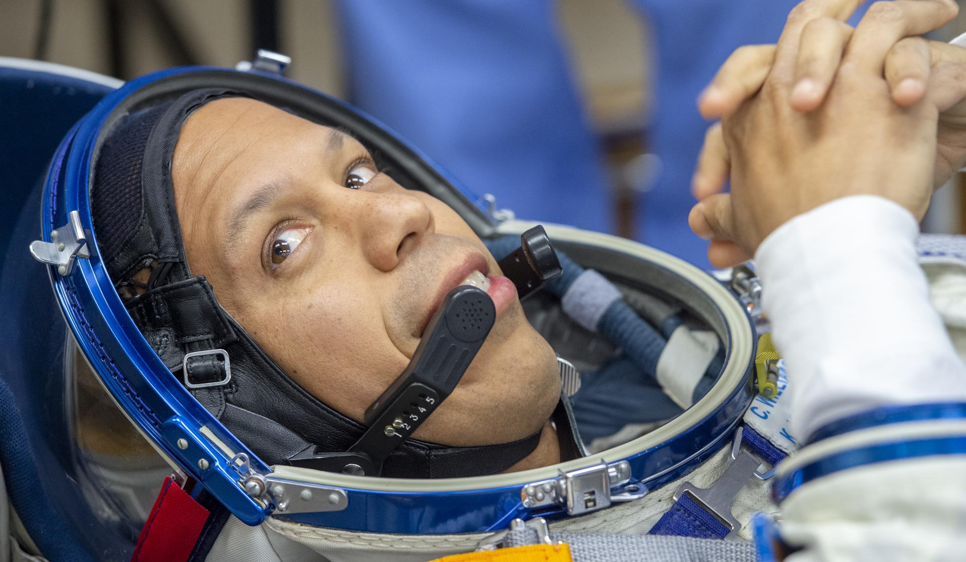 NASA astronaut Chris Williams has his Russian Sokol suit pressure checked as he and fellow crewmates, Roscosmos cosmonauts Sergei Mikaev, and Sergey Kud-Sverchkov, prepare for their Soyuz launch to the International Space Station Thursday, Nov. 27, 2025 in Baikonur, Kazakhstan. Photo Credit: (NASA/GCTC/Pavel Shvets)