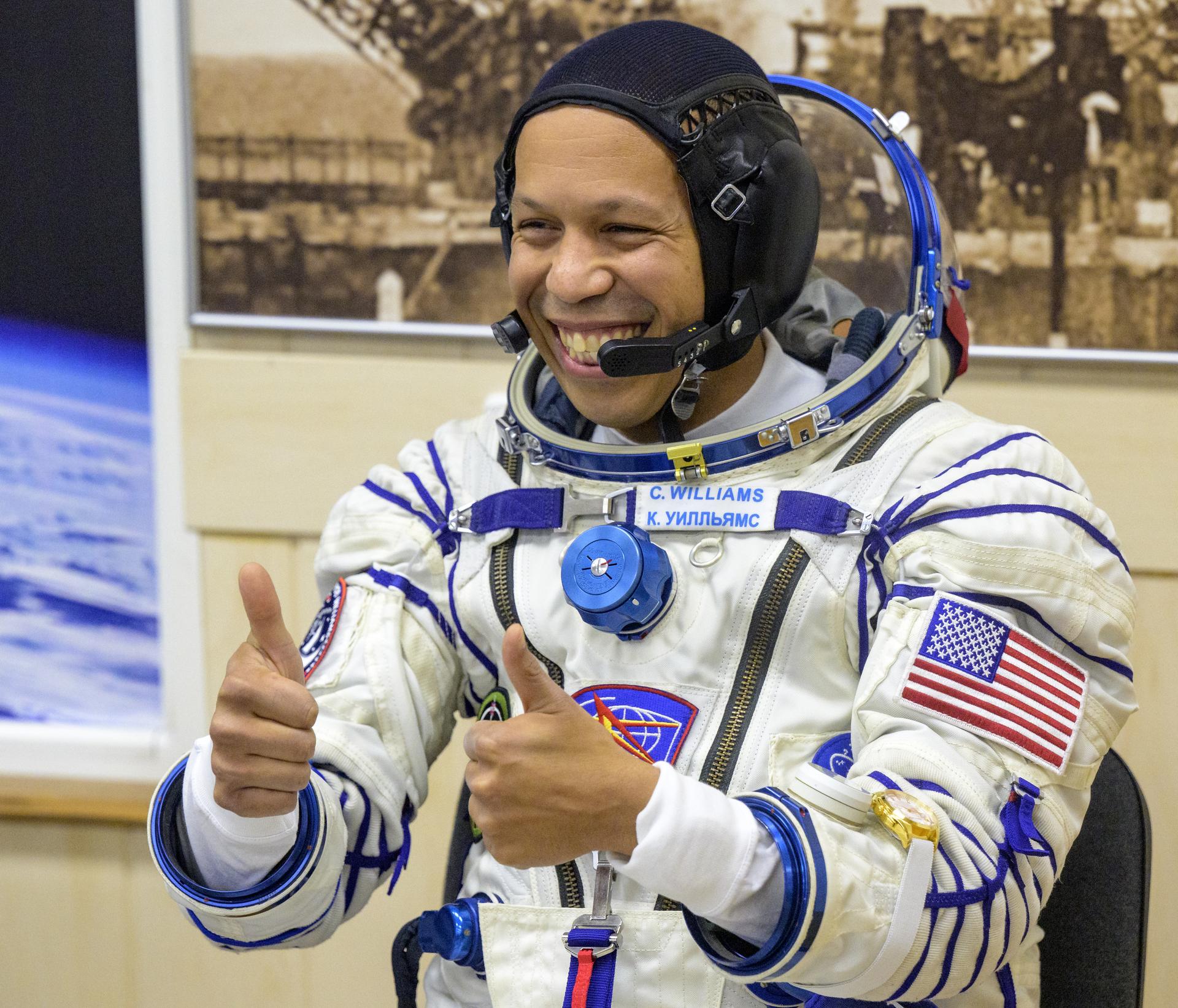 NASA astronaut Chris Williams waits to have his Russian Sokol suit pressure checked ahead of his launch on the Soyuz Rocket to the International Space Station with fellow crewmembers, Roscosmos cosmonauts Sergey Kud-Sverchkov, and Sergei Mikaev, Thursday, Nov. 27, 2025 in Baikonur, Kazakhstan. Photo Credit: (NASA/Bill Ingalls)