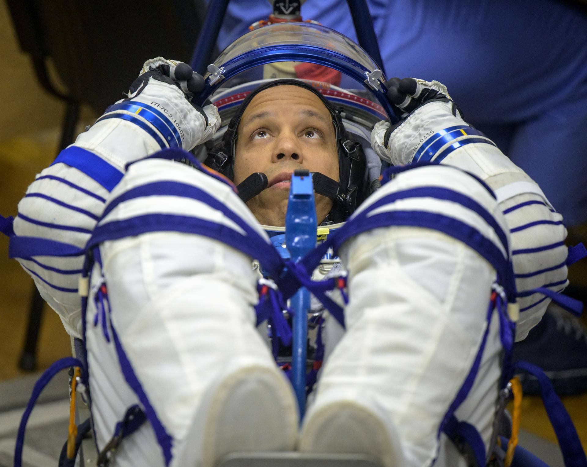NASA astronaut Chris Williams has his Russian Sokol suit pressure checked as he and Roscosmos cosmonauts Sergey Kud-Sverchkov, and Sergei Mikaev, prepare to launch in the Soyuz rocket to the International Space Station Thursday, Nov. 27, 2025 in Baikonur, Kazakhstan. Photo Credit: (NASA/Bill Ingalls)