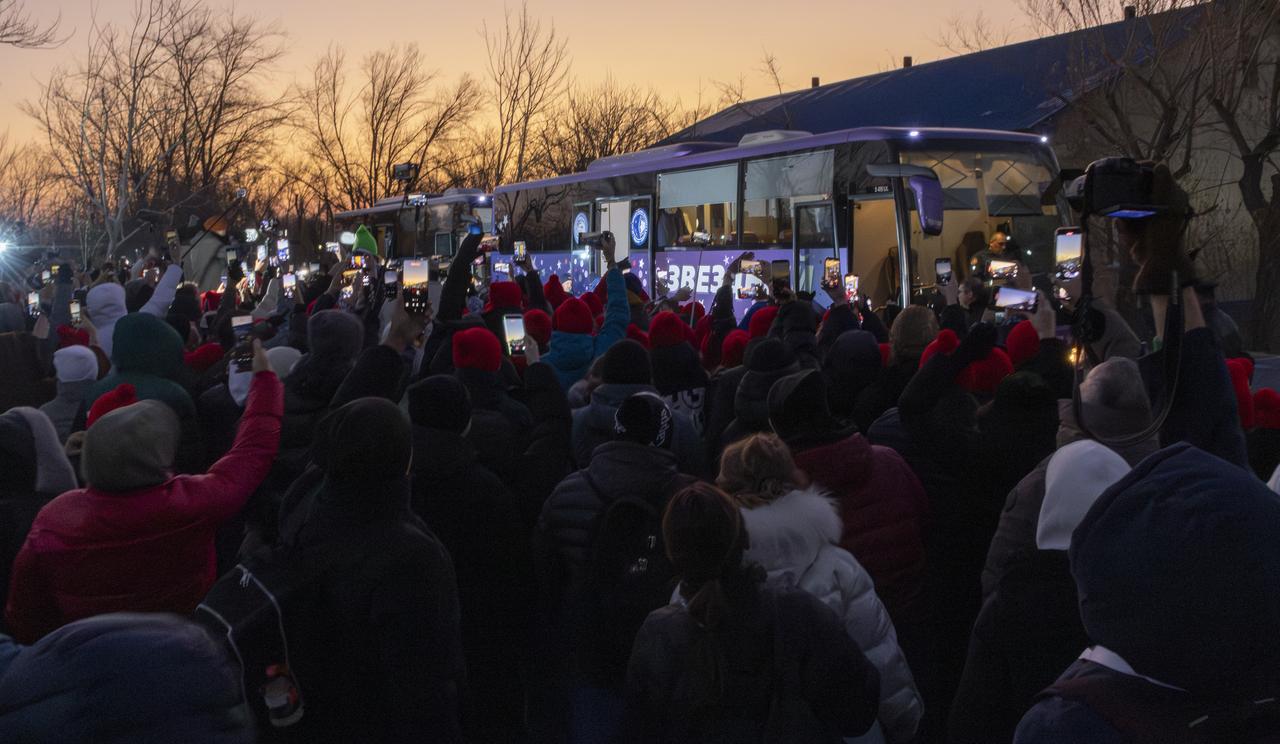 NASA astronaut Chris Williams, left, Roscosmos cosmonauts Sergei Mikaev, and Sergey Kud-Sverchkov, right, depart the Cosmonaut Hotel to suit-up for their Soyuz launch, Thursday, Nov. 27, 2025, in Baikonur, Kazakhstan. The launch will send Williams, Kud-Sverchkov and Mikaev, on a mission to the International Space Station. Photo Credit: (NASA/Victor Zelentsov)