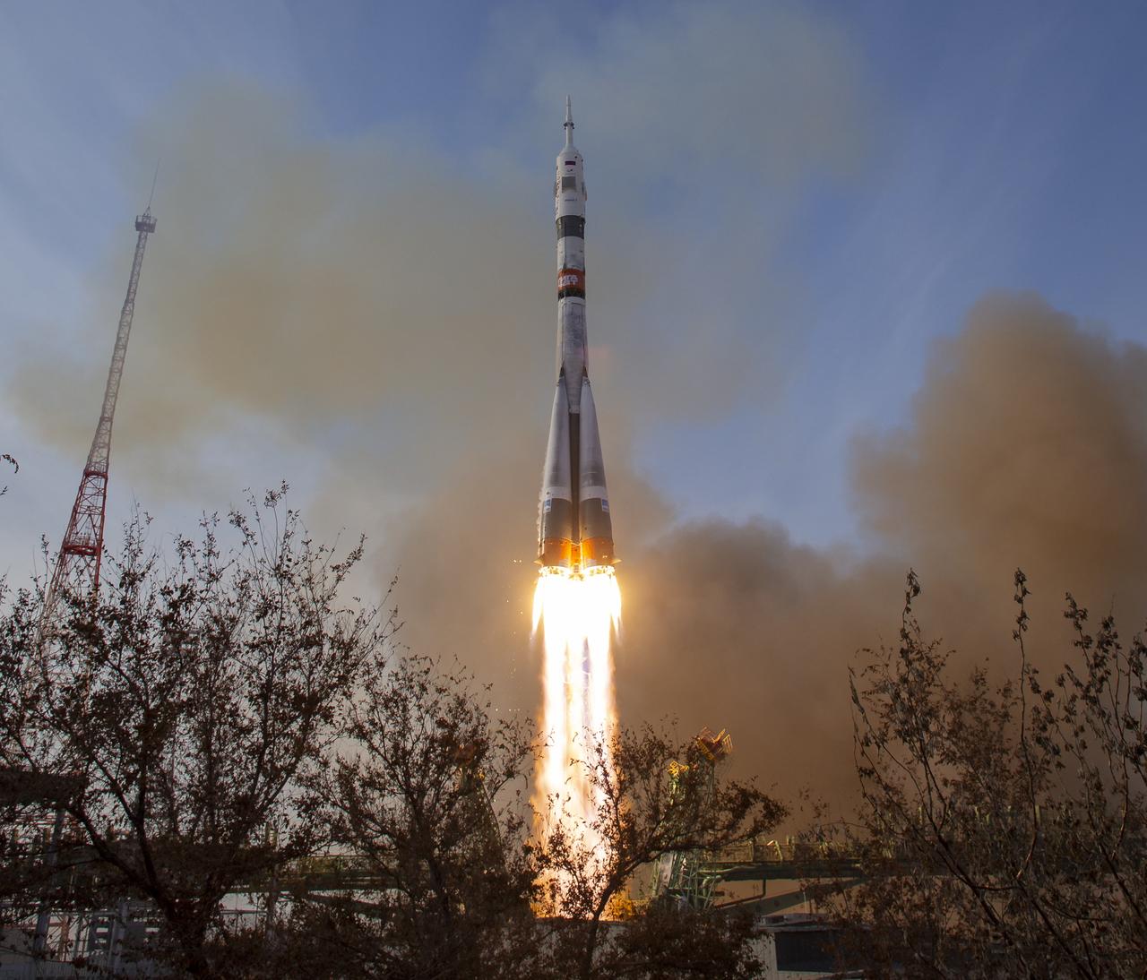The Soyuz rocket launches to the International Space Station with Expedition 74 crew members: NASA astronaut Chris Williams, Roscosmos cosmonauts Sergey Kud-Sverchkov and Sergei Mikaev, onboard, Thursday, Nov. 27, 2025, at the Baikonur Cosmodrome in Kazakhstan. Photo Credit: (NASA/Bill Ingalls)