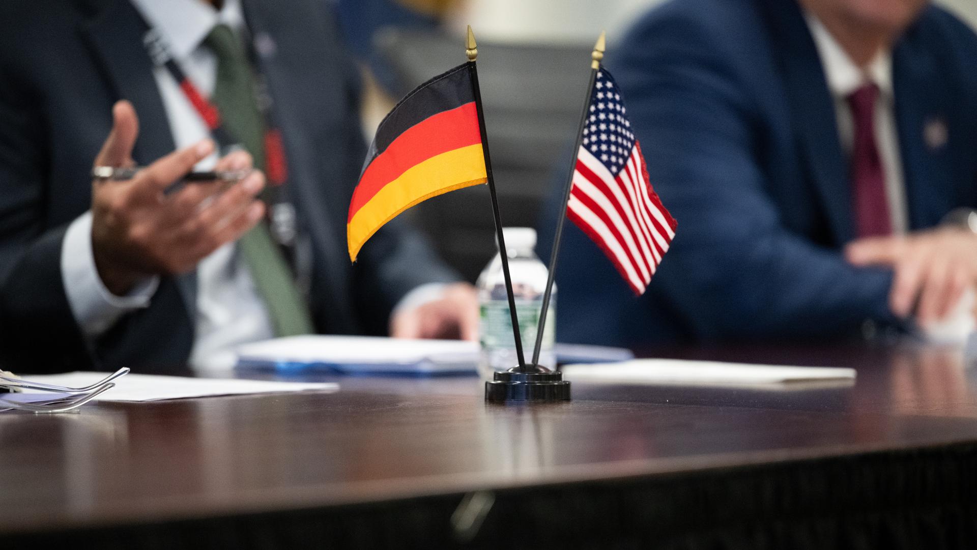 The flags of Germany and the United States are seen during a meeting with NASA leadership and German Minister for Research, Technology, and Space Dorothee Bär, Tuesday, Dec. 9, 2025, at the Mary W. Jackson NASA Headquarters building in Washington. Photo Credit: (NASA/Joel Kowsky)