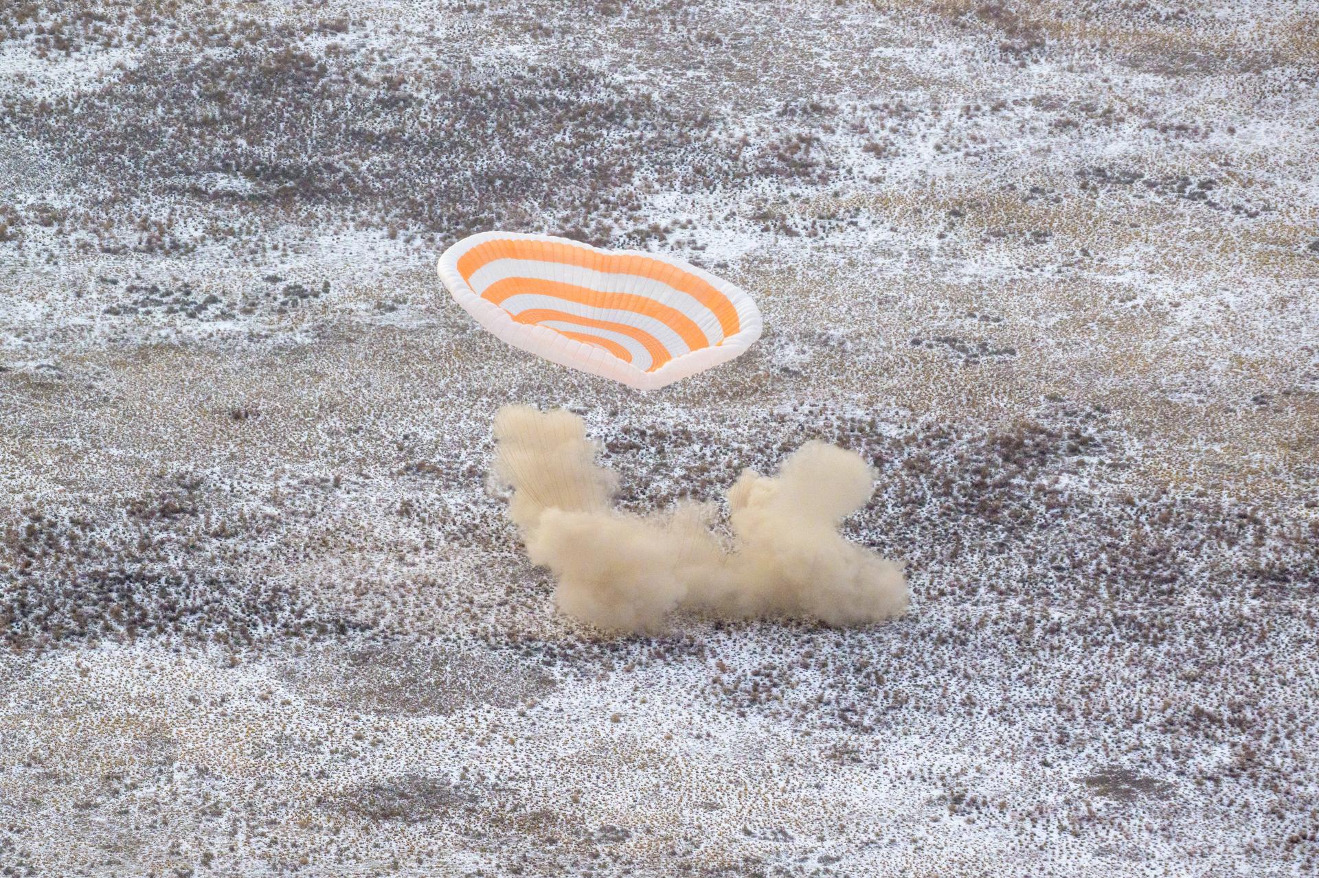 The Soyuz MS-27 spacecraft is seen as it lands in a remote area near the town of Zhezkazgan, Kazakhstan with Expedition 73 NASA astronaut Jonny Kim, and Roscosmos cosmonauts Sergey Ryzhikov, and Alexey Zubritsky aboard, Tuesday, Dec. 9, 2025. The trio are returning to Earth after logging 245 days in space as members of Expeditions 72 and 73 aboard the International Space Station. Photo Credit: (NASA/Bill Ingalls)