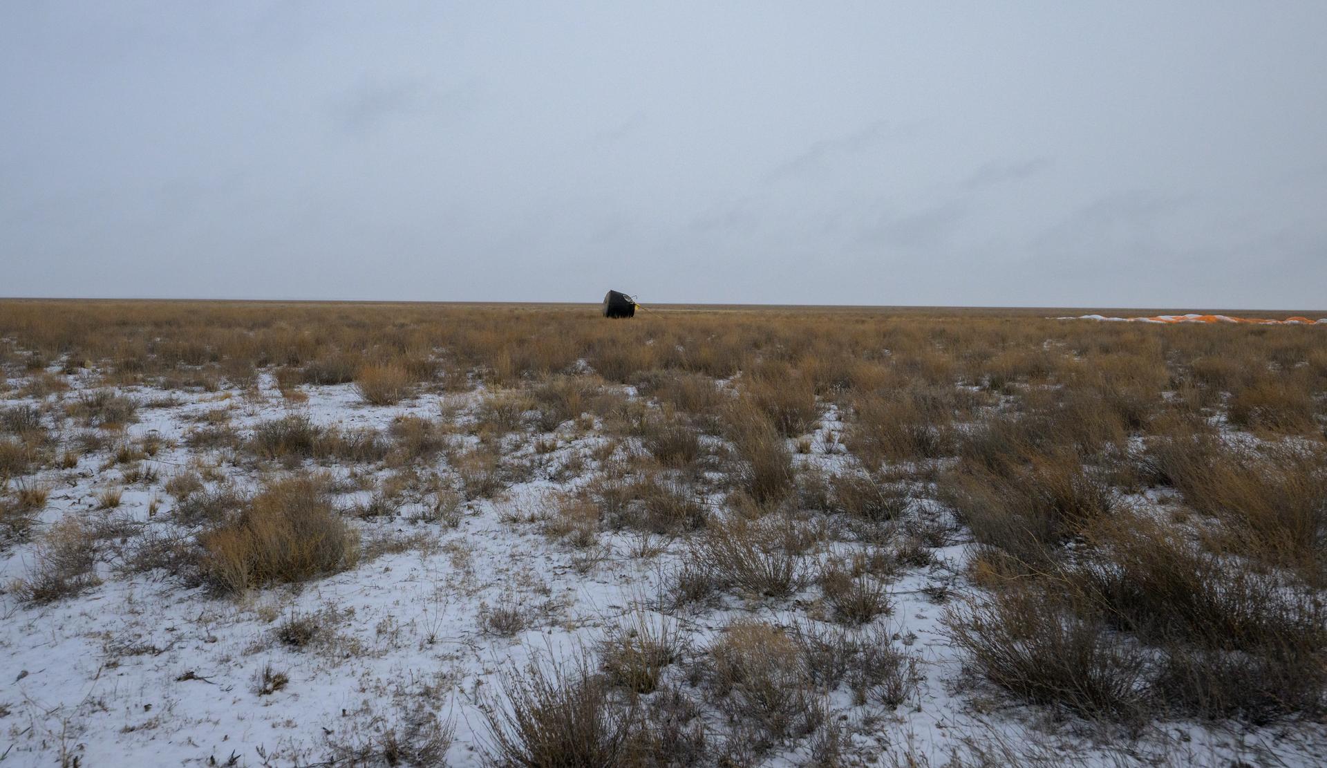 The Soyuz MS-27 spacecraft is seen after it landed in a remote area near the town of Zhezkazgan, Kazakhstan with Expedition 73 NASA astronaut Jonny Kim, and Roscosmos cosmonauts Sergey Ryzhikov, and Alexey Zubritsky aboard, Tuesday, Dec. 9, 2025. The trio are returning to Earth after logging 245 days in space as members of Expeditions 72 and 73 aboard the International Space Station. Photo Credit: (NASA/Bill Ingalls)