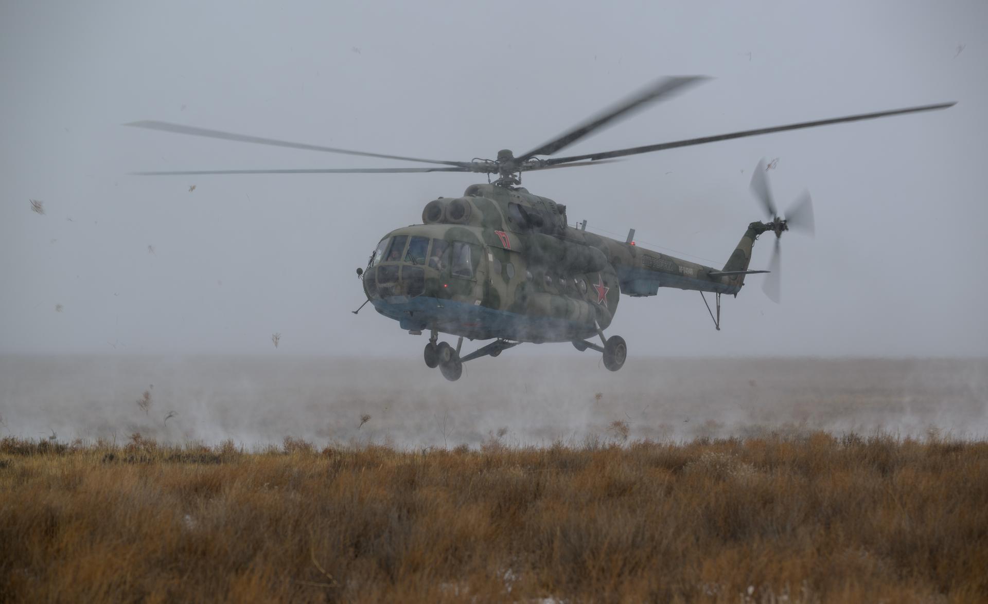 Russian Search and Rescue teams arrive at the Soyuz MS-27 spacecraft landing site shortly after it landed in a remote area near the town of Zhezkazgan, Kazakhstan with Expedition 73 NASA astronaut Jonny Kim, and Roscosmos cosmonauts Sergey Ryzhikov, and Alexey Zubritsky aboard, Tuesday, Dec. 9, 2025. The trio returned to Earth after logging 245 days in space as a members of Expeditions 72 and 73 aboard the International Space Station. Photo Credit: (NASA/Bill Ingalls)