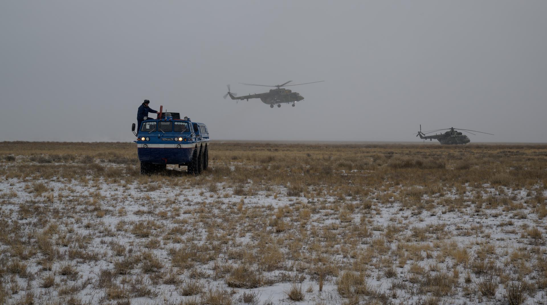 An all terrain vehicle (ATV) transports NASA astronaut Jonny Kim from the medical tent to an MI-8 helicopter to take him to Karaganda, Kazakhstan after he, Roscosmos cosmonauts Sergey Ryzhikov, and Alexey Zubritsky, landed in their Soyuz MS-27 spacecraft near the town of Zhezkazgan, Kazakhstan on Tuesday, Dec. 9, 2025. The trio returned to Earth after logging 245 days in space as a members of Expeditions 72 and 73 aboard the International Space Station. Photo Credit: (NASA/Bill Ingalls)