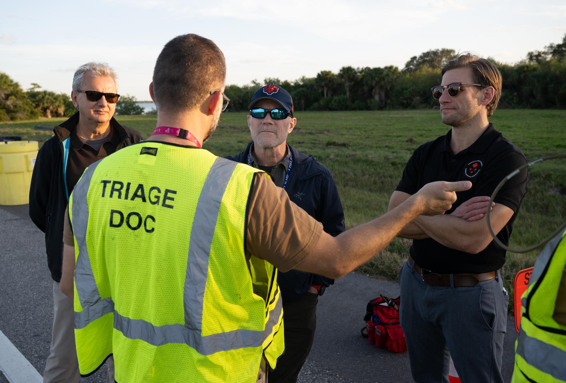 Teams at NASA's Kennedy Space Center in Florida practiced various emergency rescue training scenarios with the Artemis II crew, Friday, Dec. 19, 2025, ahead of the Artemis II mission. In the unlikely event of an emergency during launch countdown at Launch Complex 39B, personnel will be transported in mine-resistant ambush protected vehicles, or MRAPS, from the pad and to one of the triage site locations at Kennedy. Photo Credit: (NASA/Joel Kowsky)