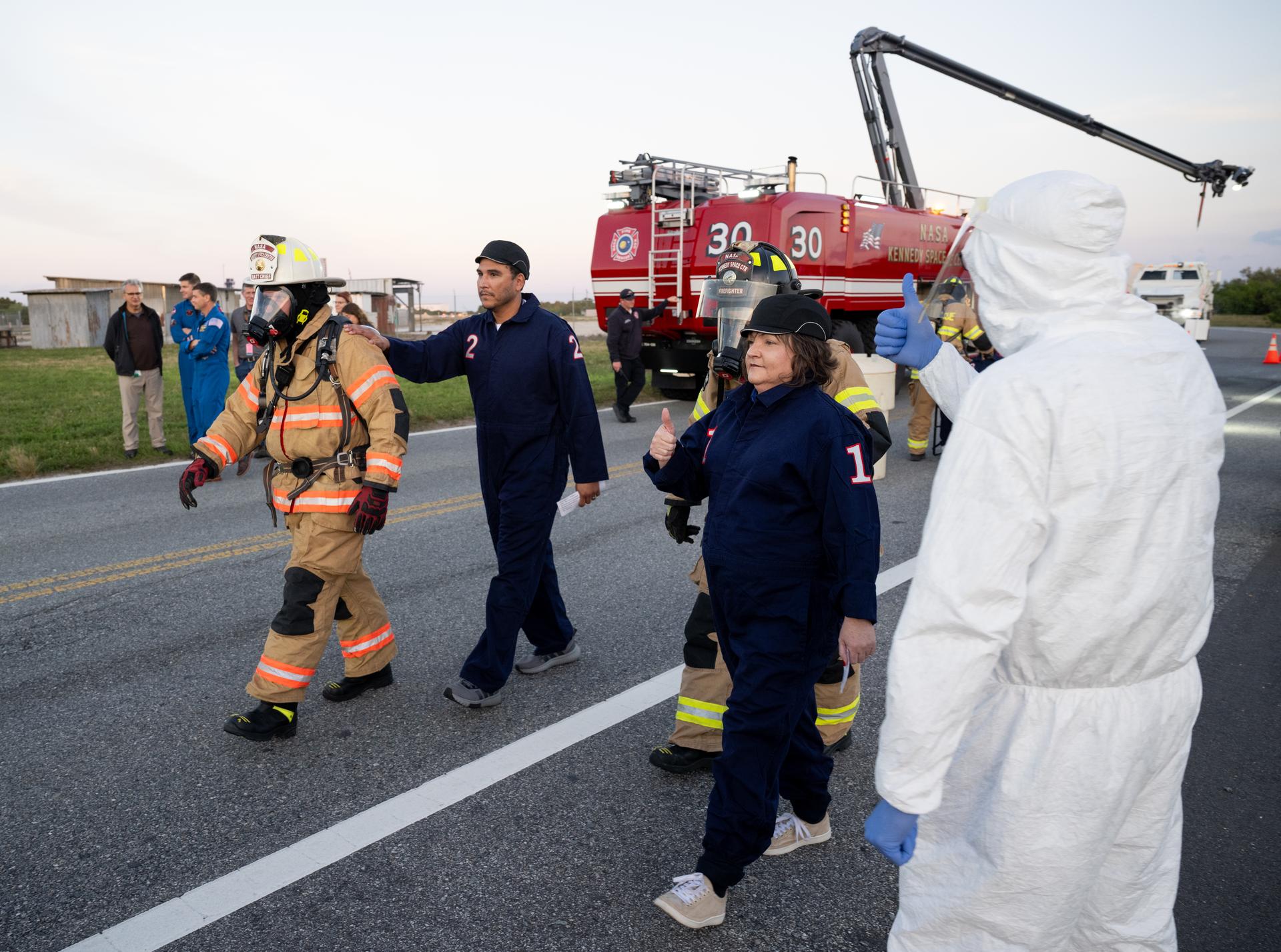 Teams at NASA's Kennedy Space Center in Florida practiced various emergency rescue training scenarios with the Artemis II crew, Friday, Dec. 19, 2025, ahead of the Artemis II mission. In the unlikely event of an emergency during launch countdown at Launch Complex 39B, personnel will be transported in mine-resistant ambush protected vehicles, or MRAPS, from the pad and to one of the triage site locations at Kennedy. Photo Credit: (NASA/Joel Kowsky)