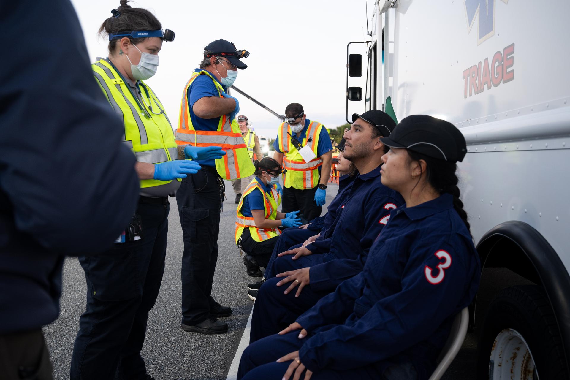 Teams at NASA's Kennedy Space Center in Florida practiced various emergency rescue training scenarios with the Artemis II crew, Friday, Dec. 19, 2025, ahead of the Artemis II mission. In the unlikely event of an emergency during launch countdown at Launch Complex 39B, personnel will be transported in mine-resistant ambush protected vehicles, or MRAPS, from the pad and to one of the triage site locations at Kennedy. Photo Credit: (NASA/Joel Kowsky)