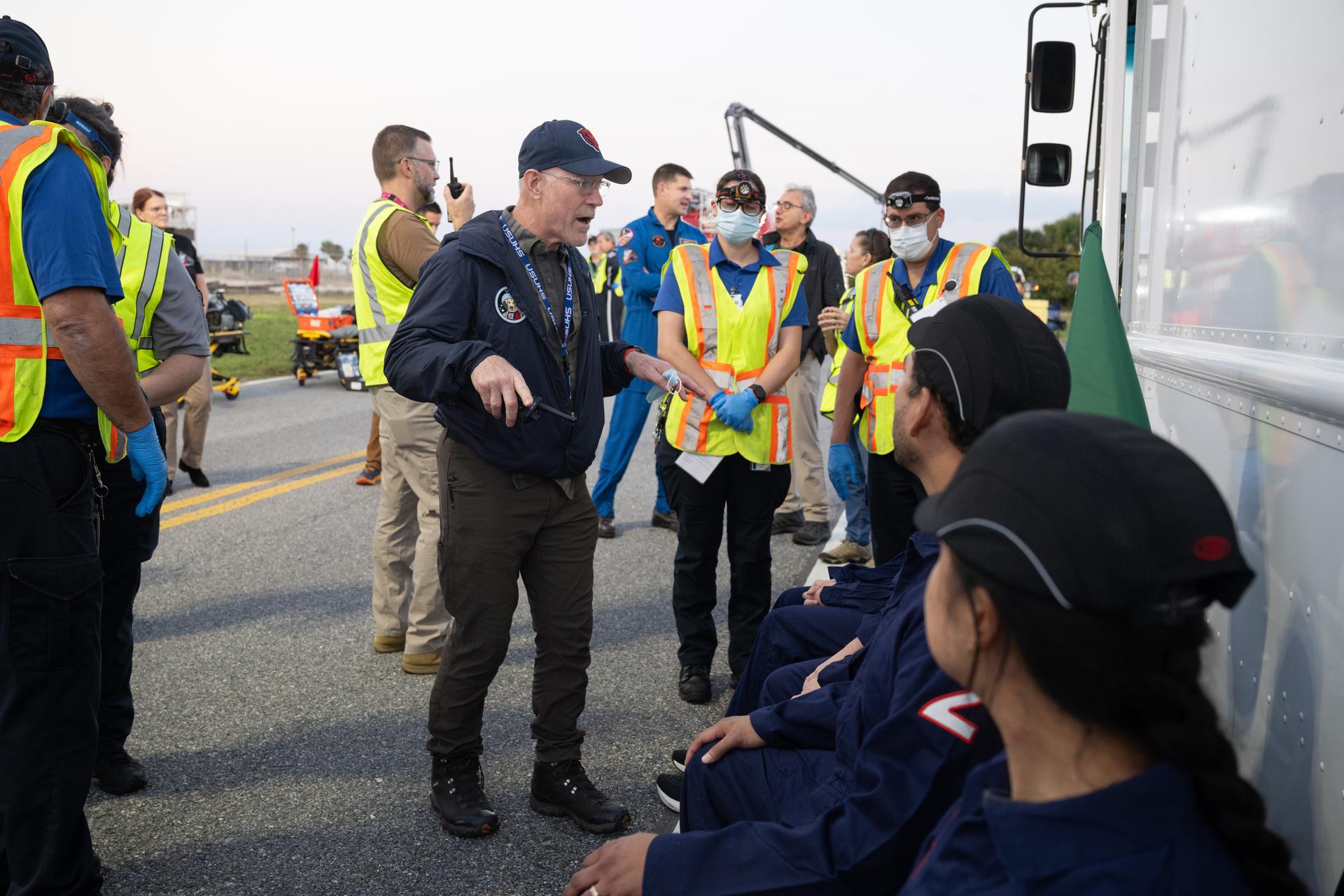 Teams at NASA's Kennedy Space Center in Florida practiced various emergency rescue training scenarios with the Artemis II crew, Friday, Dec. 19, 2025, ahead of the Artemis II mission. In the unlikely event of an emergency during launch countdown at Launch Complex 39B, personnel will be transported in mine-resistant ambush protected vehicles, or MRAPS, from the pad and to one of the triage site locations at Kennedy. Photo Credit: (NASA/Joel Kowsky)