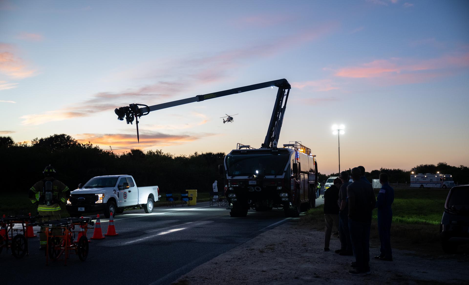 Teams at NASA's Kennedy Space Center in Florida practiced various emergency rescue training scenarios with the Artemis II crew, Friday, Dec. 19, 2025, ahead of the Artemis II mission. In the unlikely event of an emergency during launch countdown at Launch Complex 39B, personnel will be transported in mine-resistant ambush protected vehicles, or MRAPS, from the pad and to one of the triage site locations at Kennedy. Photo Credit: (NASA/Joel Kowsky)