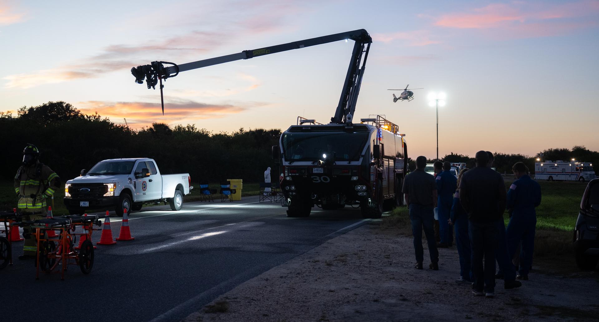 Teams at NASA's Kennedy Space Center in Florida practiced various emergency rescue training scenarios with the Artemis II crew, Friday, Dec. 19, 2025, ahead of the Artemis II mission. In the unlikely event of an emergency during launch countdown at Launch Complex 39B, personnel will be transported in mine-resistant ambush protected vehicles, or MRAPS, from the pad and to one of the triage site locations at Kennedy. Photo Credit: (NASA/Joel Kowsky)