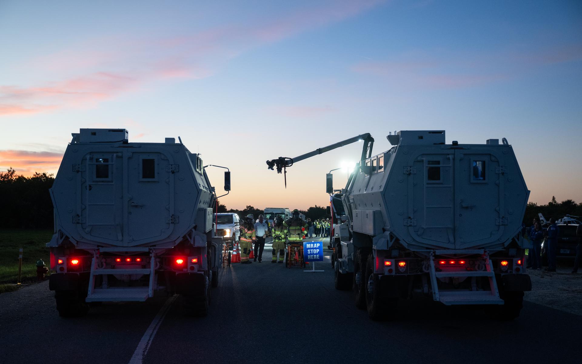 Teams at NASA's Kennedy Space Center in Florida practiced various emergency rescue training scenarios with the Artemis II crew, Friday, Dec. 19, 2025, ahead of the Artemis II mission. In the unlikely event of an emergency during launch countdown at Launch Complex 39B, personnel will be transported in mine-resistant ambush protected vehicles, or MRAPS, from the pad and to one of the triage site locations at Kennedy. Photo Credit: (NASA/Joel Kowsky)