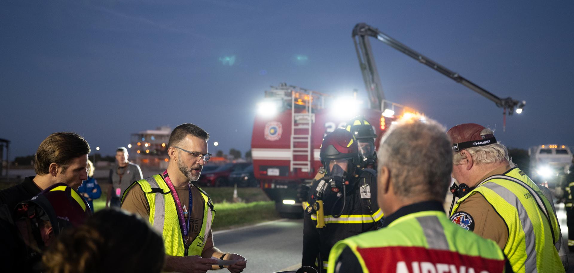 Teams at NASA's Kennedy Space Center in Florida practiced various emergency rescue training scenarios with the Artemis II crew, Friday, Dec. 19, 2025, ahead of the Artemis II mission. In the unlikely event of an emergency during launch countdown at Launch Complex 39B, personnel will be transported in mine-resistant ambush protected vehicles, or MRAPS, from the pad and to one of the triage site locations at Kennedy. Photo Credit: (NASA/Joel Kowsky)