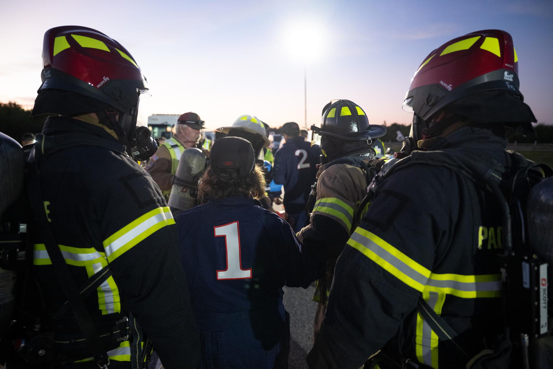 Teams at NASA's Kennedy Space Center in Florida practiced various emergency rescue training scenarios with the Artemis II crew, Friday, Dec. 19, 2025, ahead of the Artemis II mission. In the unlikely event of an emergency during launch countdown at Launch Complex 39B, personnel will be transported in mine-resistant ambush protected vehicles, or MRAPS, from the pad and to one of the triage site locations at Kennedy. Photo Credit: (NASA/Joel Kowsky)
