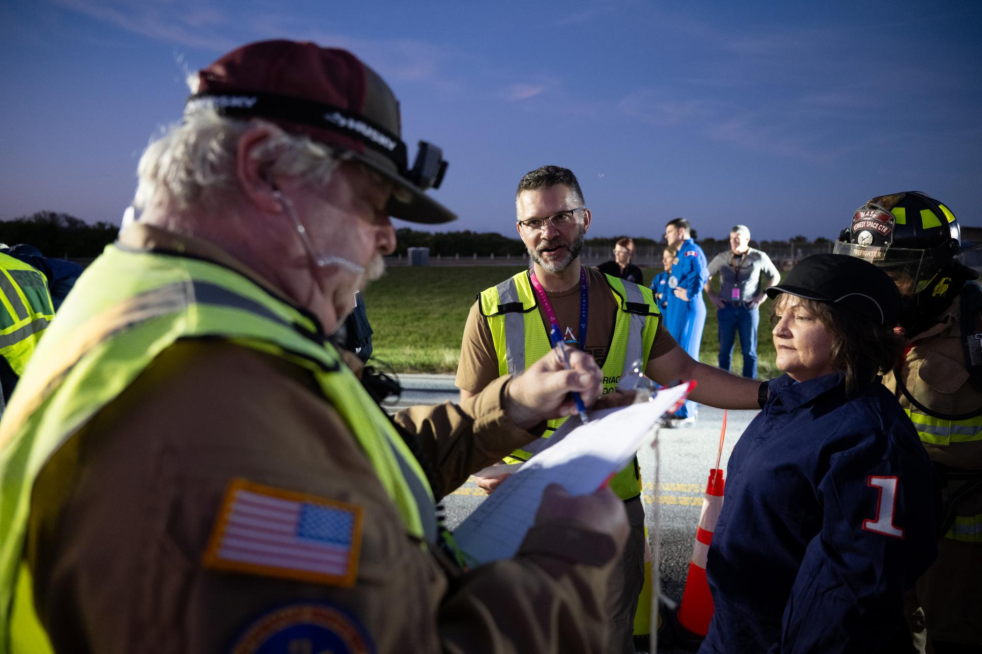 Teams at NASA's Kennedy Space Center in Florida practiced various emergency rescue training scenarios with the Artemis II crew, Friday, Dec. 19, 2025, ahead of the Artemis II mission. In the unlikely event of an emergency during launch countdown at Launch Complex 39B, personnel will be transported in mine-resistant ambush protected vehicles, or MRAPS, from the pad and to one of the triage site locations at Kennedy. Photo Credit: (NASA/Joel Kowsky)