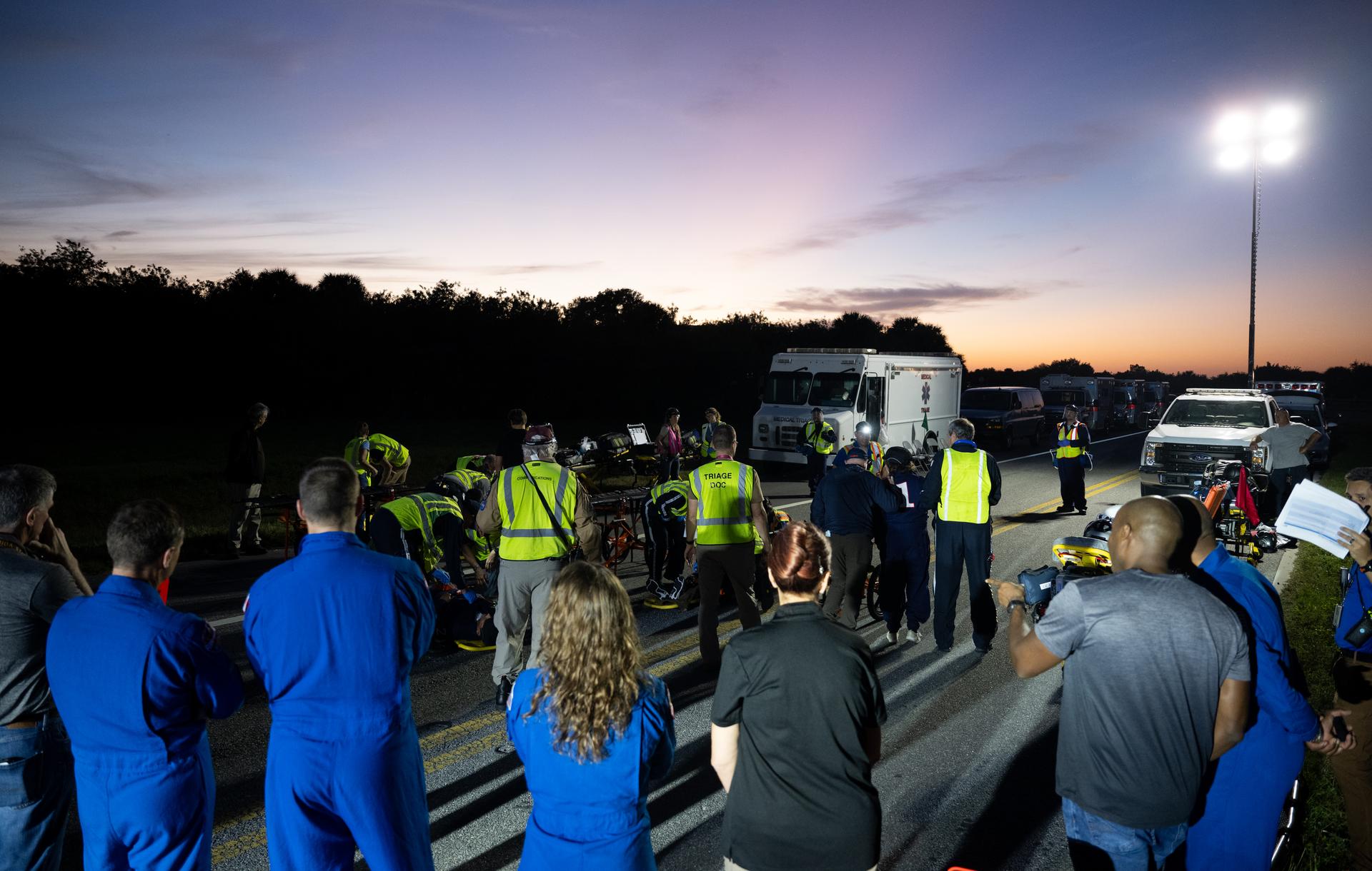 Teams at NASA's Kennedy Space Center in Florida practiced various emergency rescue training scenarios with the Artemis II crew, Friday, Dec. 19, 2025, ahead of the Artemis II mission. In the unlikely event of an emergency during launch countdown at Launch Complex 39B, personnel will be transported in mine-resistant ambush protected vehicles, or MRAPS, from the pad and to one of the triage site locations at Kennedy. Photo Credit: (NASA/Joel Kowsky)