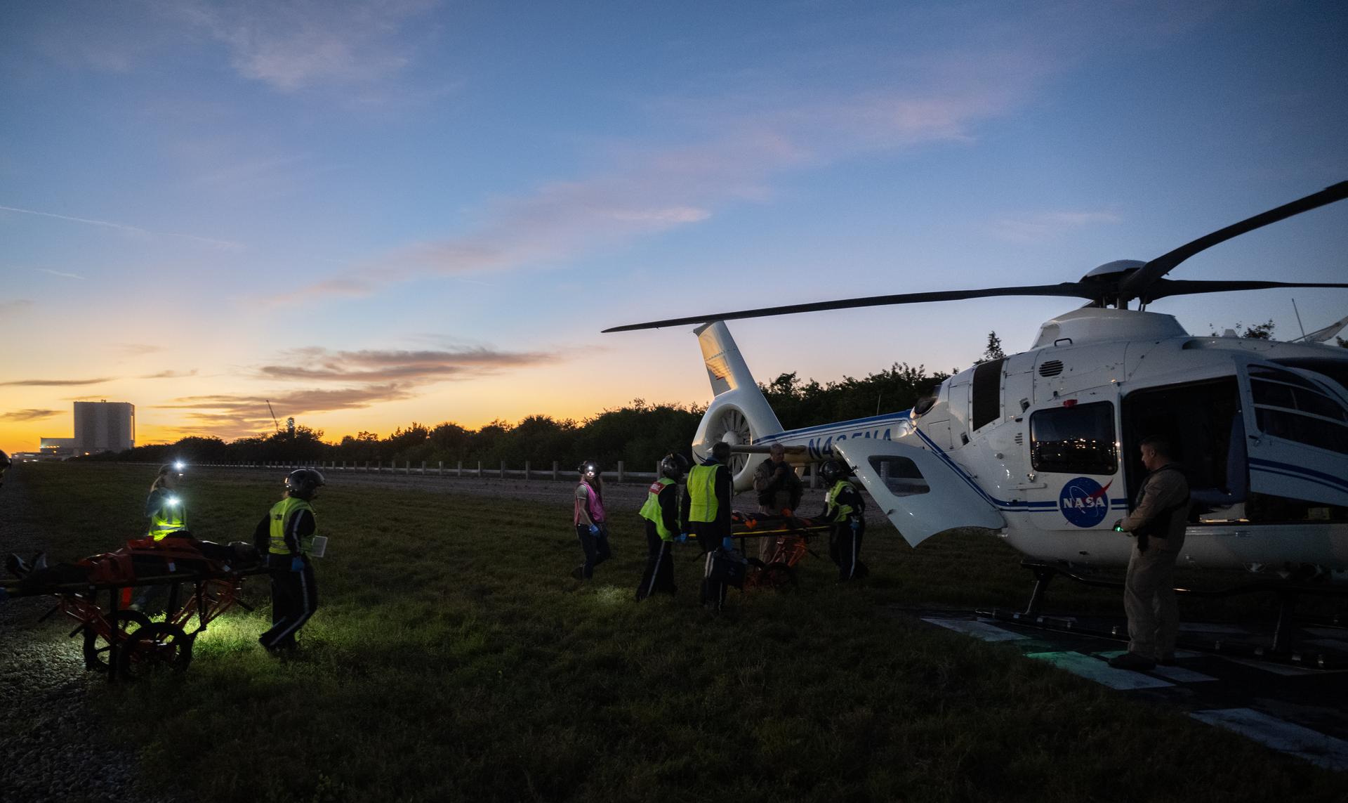 Teams at NASA's Kennedy Space Center in Florida practiced various emergency rescue training scenarios with the Artemis II crew, Friday, Dec. 19, 2025, ahead of the Artemis II mission. In the unlikely event of an emergency during launch countdown at Launch Complex 39B, personnel will be transported in mine-resistant ambush protected vehicles, or MRAPS, from the pad and to one of the triage site locations at Kennedy. Photo Credit: (NASA/Joel Kowsky)