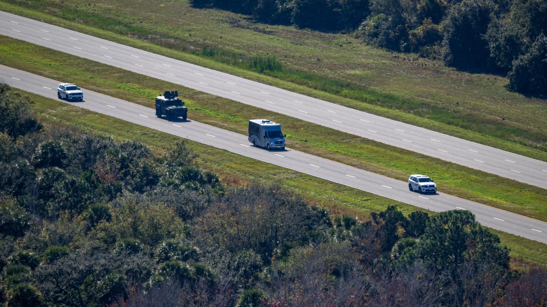 The astronaut transport vehicle carrying Artemis II crewmembers NASA astronauts Reid Wiseman, commander; Victor Glover, pilot; Christina Koch, mission specialist; and CSA (Canadian Space Agency) astronaut Jeremy Hansen, mission specialist is seen as it approaches the Vehicle Assembly Building during the Artemis II countdown demonstration test, Saturday, Dec. 20, 2025, at NASA’s Kennedy Space Center in Florida. For this operation, the Artemis II crew and launch teams are simulating the launch day timeline including suit-up, walkout, and spacecraft ingress and egress. Through the Artemis campaign, NASA will send astronauts to explore the Moon for scientific discovery, economic benefits, and to build the foundation for the first crewed missions to Mars, for the benefit of all. Photo Credit: (NASA/Keegan Barber)