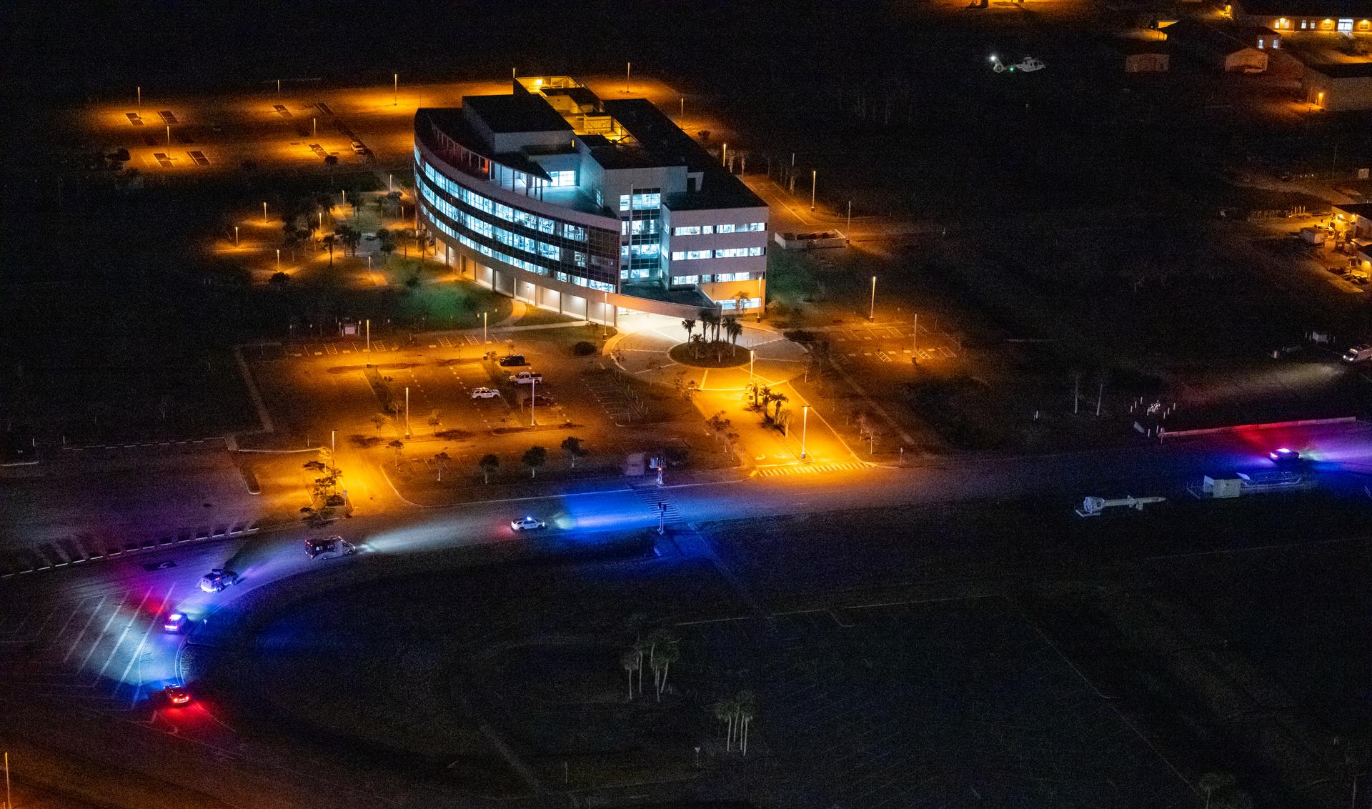 The astronaut transport vehicle carrying Artemis II crewmembers NASA astronauts Reid Wiseman, commander; Victor Glover, pilot; Christina Koch, mission specialist; and CSA (Canadian Space Agency) astronaut Jeremy Hansen, mission specialist is seen as it departs the Vehicle Assembly Building following the Artemis II countdown demonstration test, Saturday, Dec. 20, 2025, at NASA’s Kennedy Space Center in Florida. For this operation, the Artemis II crew and launch teams simulated the launch day timeline including suit-up, walkout, and spacecraft ingress and egress. Through the Artemis campaign, NASA will send astronauts to explore the Moon for scientific discovery, economic benefits, and to build the foundation for the first crewed missions to Mars, for the benefit of all. Photo Credit: (NASA/Keegan Barber)