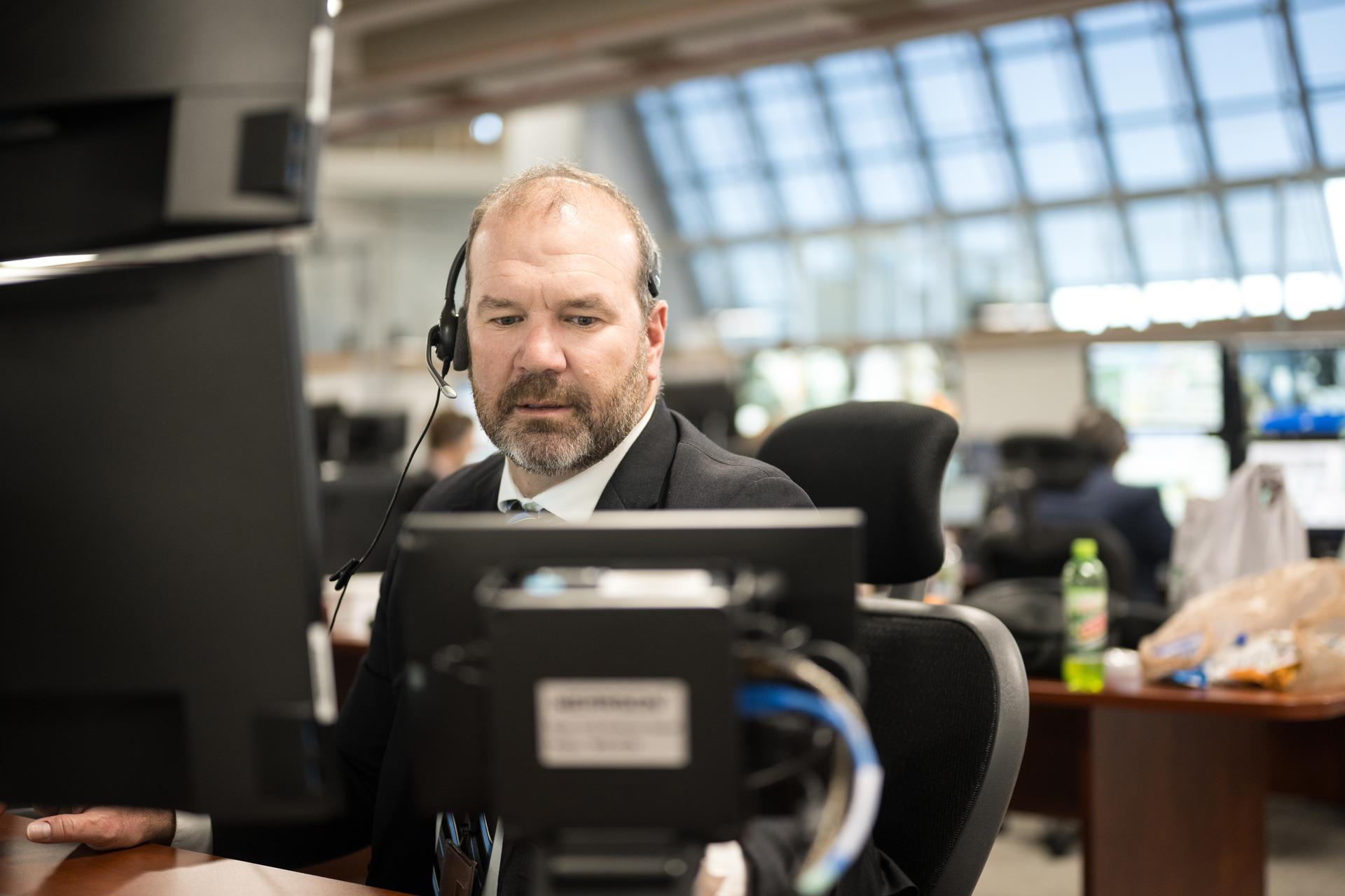 Teams monitor the progress of a Countdown Demonstration Test with Artemis II crewmembers NASA astronauts Reid Wiseman, commander; Victor Glover, pilot; Christina Koch, mission specialist; and CSA (Canadian Space Agency) astronaut Jeremy Hansen, mission specialist onboard their Orion spacecraft from Firing Room 2 of the Rocco A. Petrone Launch Control Center, Saturday, Dec. 20, 2025, at NASA’s Kennedy Space Center in Florida. For this operation, the Artemis II crew and launch teams are simulating the launch day timeline including suit-up, walkout, and spacecraft ingress and egress.  Through the Artemis campaign, NASA will send astronauts to explore the Moon for scientific discovery, economic benefits, and to build the foundation for the first crewed missions to Mars, for the benefit of all. Photo Credit: (NASA/Aubrey Gemignani)