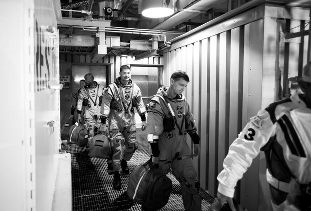 Artemis II crewmembers NASA astronauts Reid Wiseman, commander; Victor Glover...