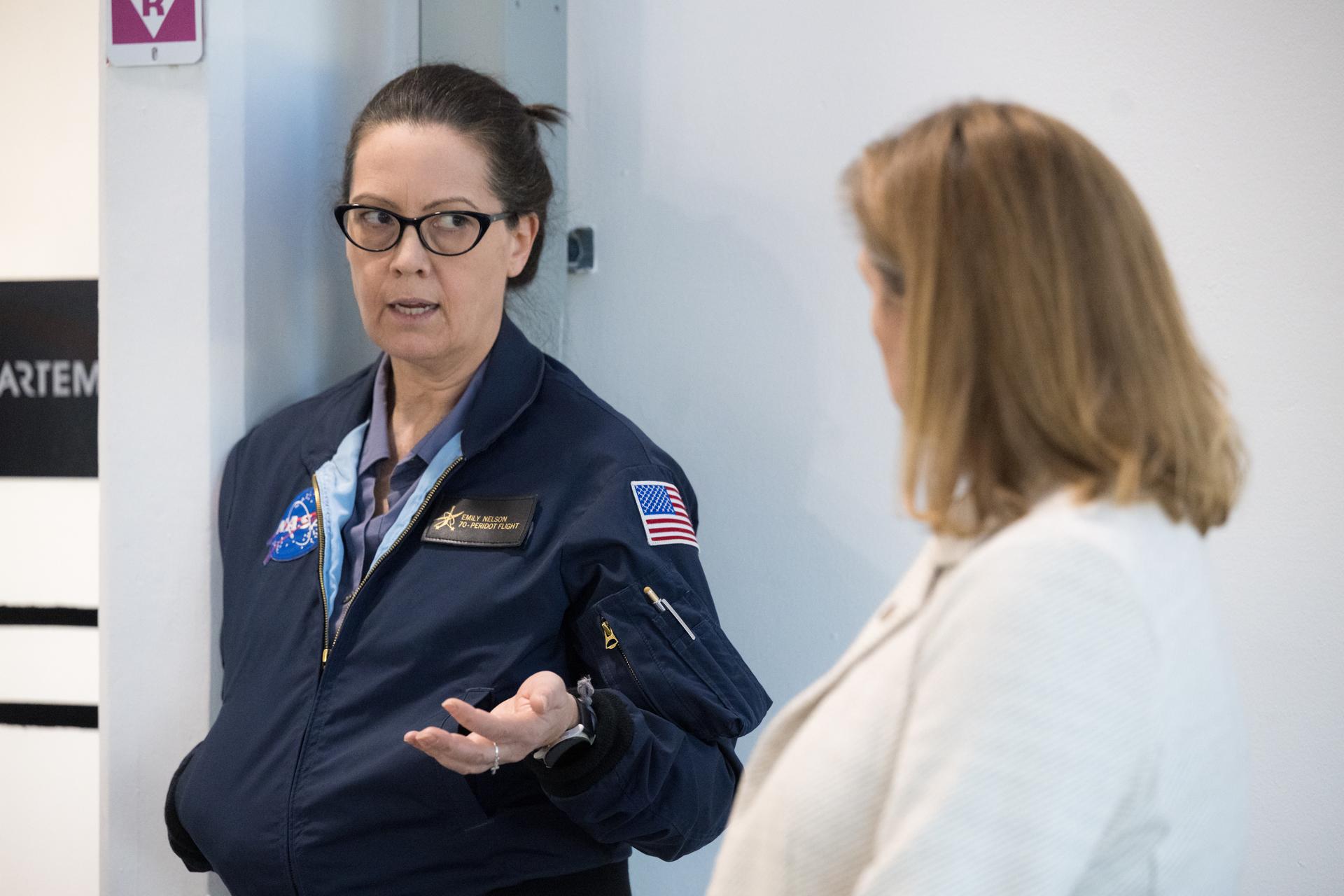 Emily Nelson, NASA's chief flight director, and Lori Glaze, acting associate administrator for NASA's Exploration Systems Development Mission Directorate, discuss the progress of a Countdown Demonstration Test with Artemis II crewmembers NASA astronauts Reid Wiseman, commander; Victor Glover, pilot; Christina Koch, mission specialist; and CSA (Canadian Space Agency) astronaut Jeremy Hansen, mission specialist onboard their Orion spacecraft from Firing Room 2 of the Rocco A. Petrone Launch Control Center, Saturday, Dec. 20, 2025, at NASA’s Kennedy Space Center in Florida. For this operation, the Artemis II crew and launch teams are simulating the launch day timeline including suit-up, walkout, and spacecraft ingress and egress.  Through the Artemis campaign, NASA will send astronauts to explore the Moon for scientific discovery, economic benefits, and to build the foundation for the first crewed missions to Mars, for the benefit of all. Photo Credit: (NASA/Aubrey Gemignani)