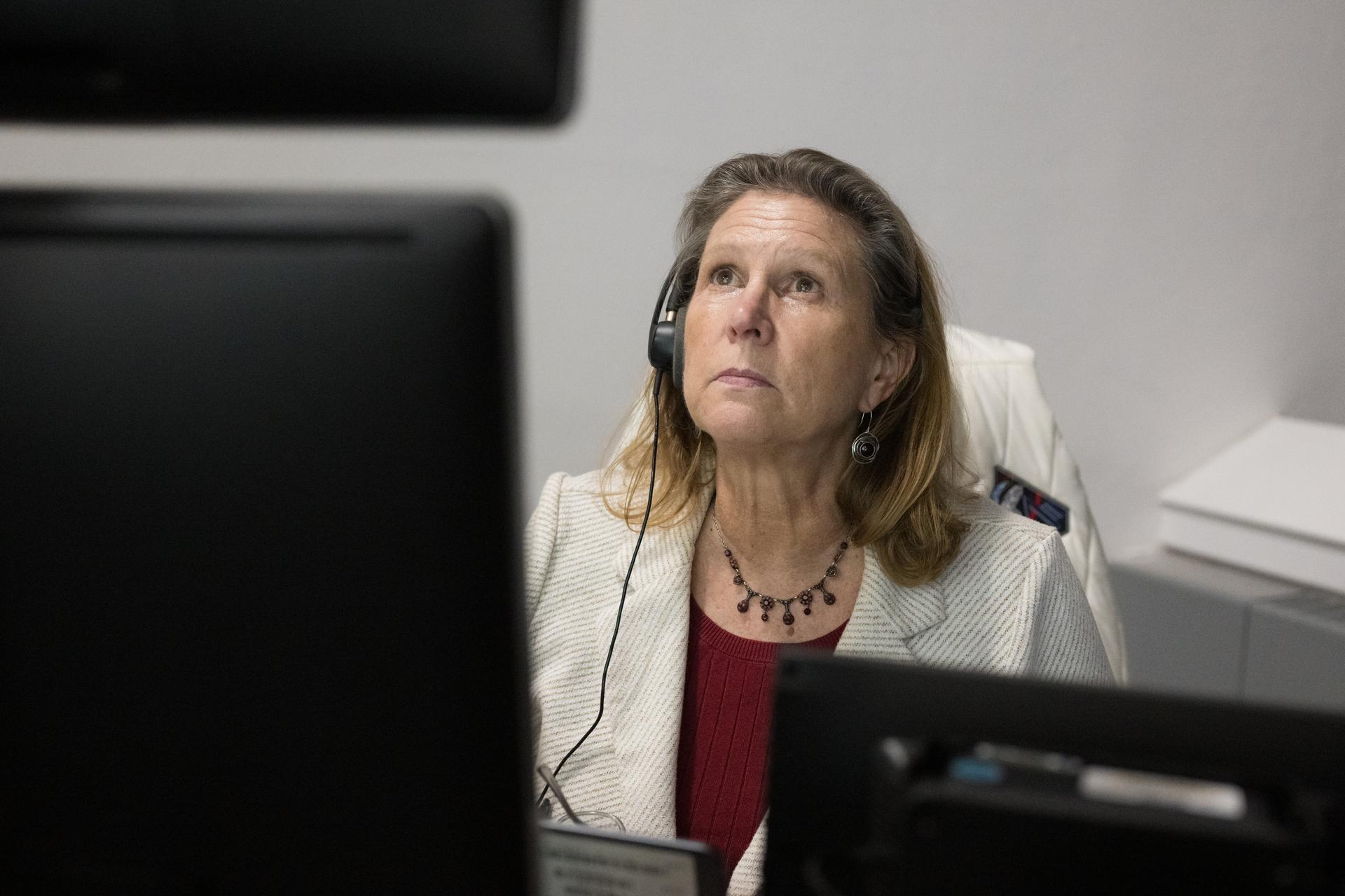 Lori Glaze, acting associate administrator for NASA's Exploration Systems Development Mission Directorate monitors the progress of a Countdown Demonstration Test with Artemis II crewmembers NASA astronauts Reid Wiseman, commander; Victor Glover, pilot; Christina Koch, mission specialist; and CSA (Canadian Space Agency) astronaut Jeremy Hansen, mission specialist onboard their Orion spacecraft from Firing Room 2 of the Rocco A. Petrone Launch Control Center, Saturday, Dec. 20, 2025, at NASA’s Kennedy Space Center in Florida. For this operation, the Artemis II crew and launch teams are simulating the launch day timeline including suit-up, walkout, and spacecraft ingress and egress.  Through the Artemis campaign, NASA will send astronauts to explore the Moon for scientific discovery, economic benefits, and to build the foundation for the first crewed missions to Mars, for the benefit of all. Photo Credit: (NASA/Aubrey Gemignani)