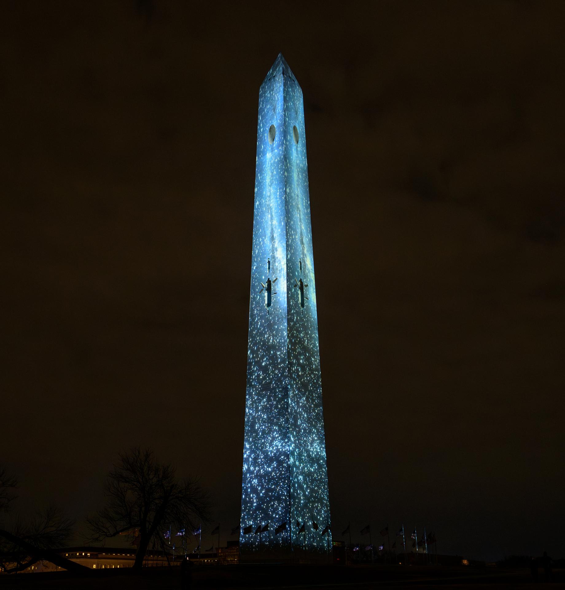 Images depicting NASA missions are projected onto the Washington Monument as part of an event to kick off the nation's 250th birthday year, Wednesday, Dec. 31, 2025, in Washington. Photo Credit: (NASA/Bill Ingalls)