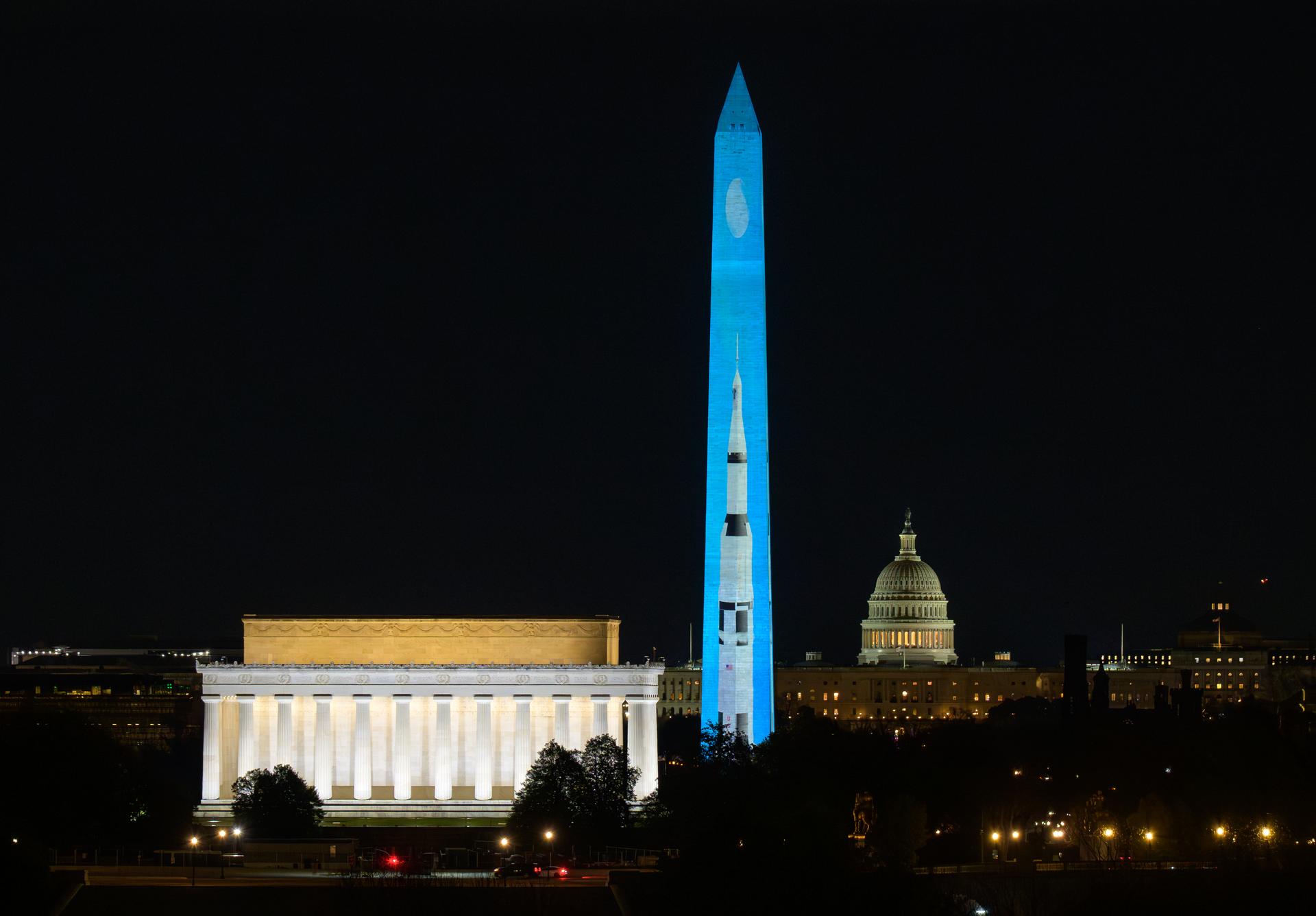 Images depicting NASA’s Saturn V Rocket are projected onto the Washington Monument as part of an event to kick off the nation's 250th birthday year, Wednesday, Dec. 31, 2025, in Washington. Photo Credit: (NASA/Bill Ingalls)